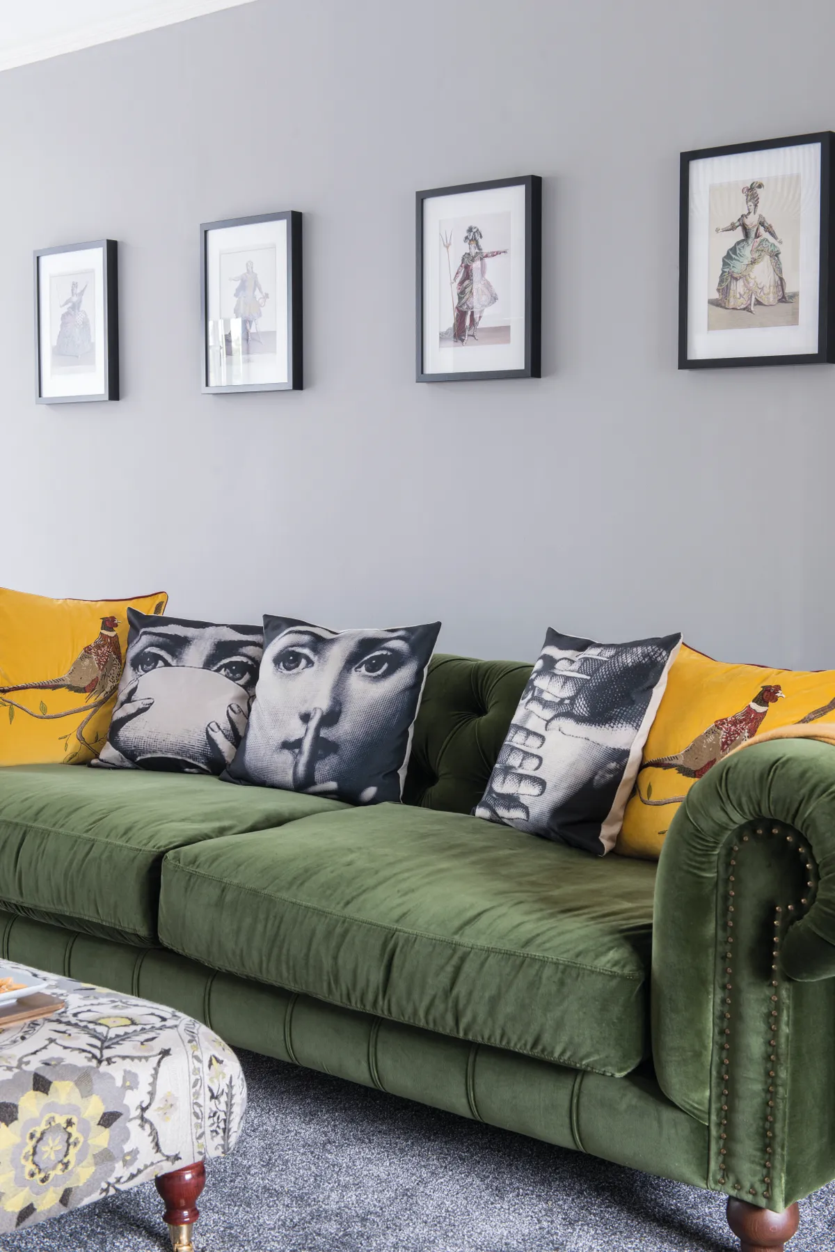 Debra searched carefully to find the pictures of famous opera costumes to frame and for cushions by the artist, Fornasetti, whose designs inspired the wallpaper