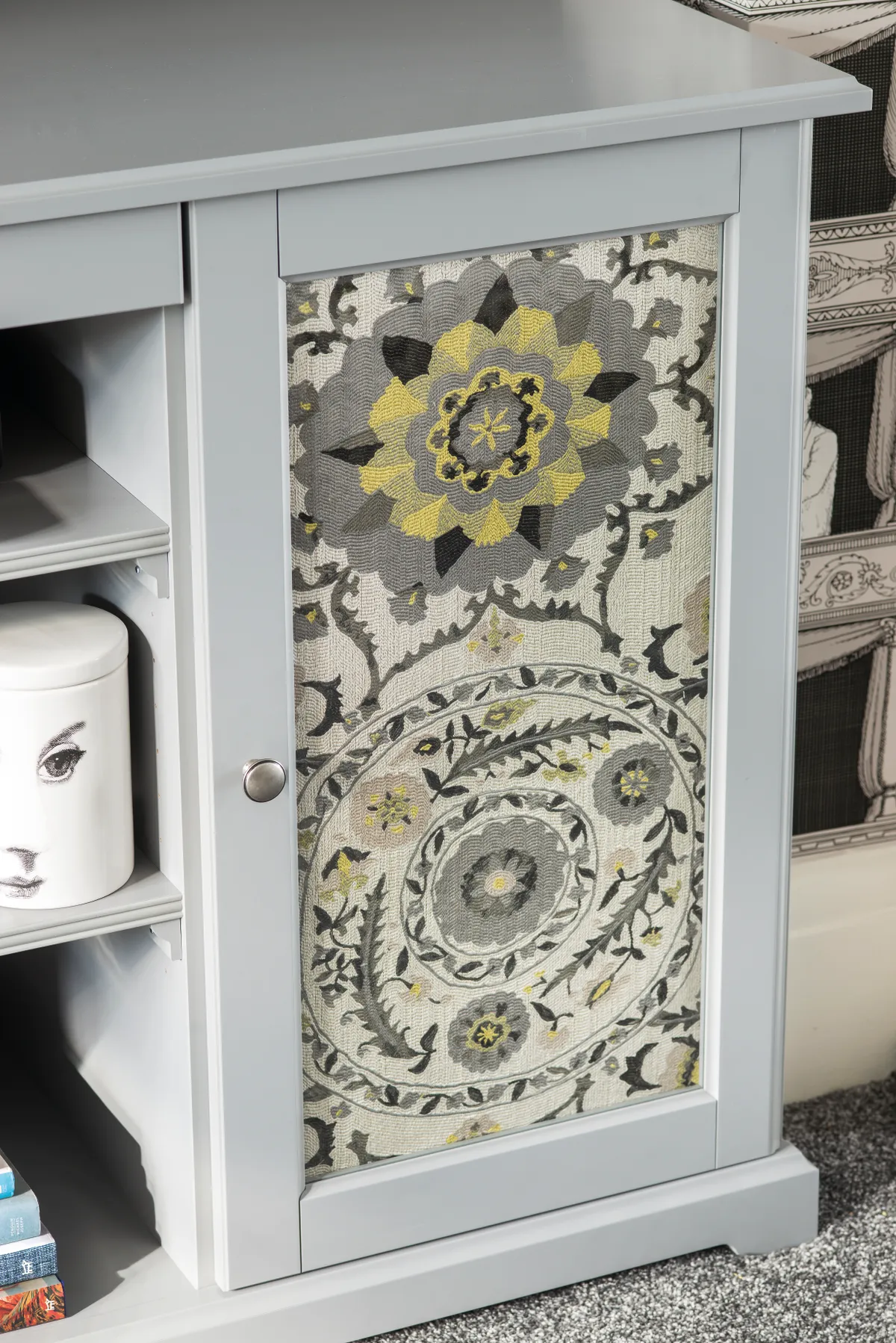 Good idea! A sideboard provides plenty of storage and keeps anything messy out of sight. Debra has covered the two glass panels at the ends with leftover fabric to tie it in with the overall scheme