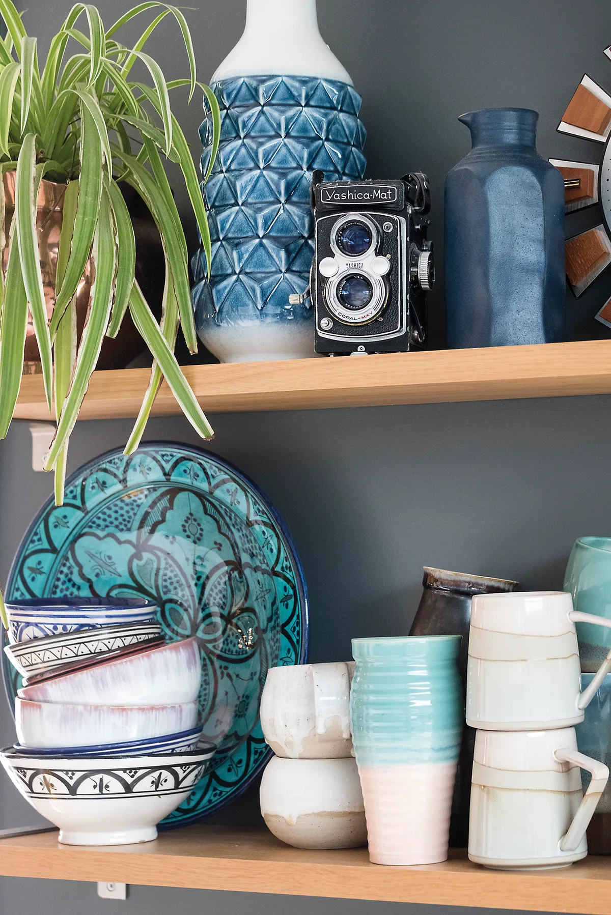 The kitchen shelves show off a characterful china collection alongside one of Sophie’s late father’s old cameras. ‘There’s pottery by local craftspeople, pieces from holidays abroad and even budget bits from TK Maxx, and most of it gets used every day,’ she says