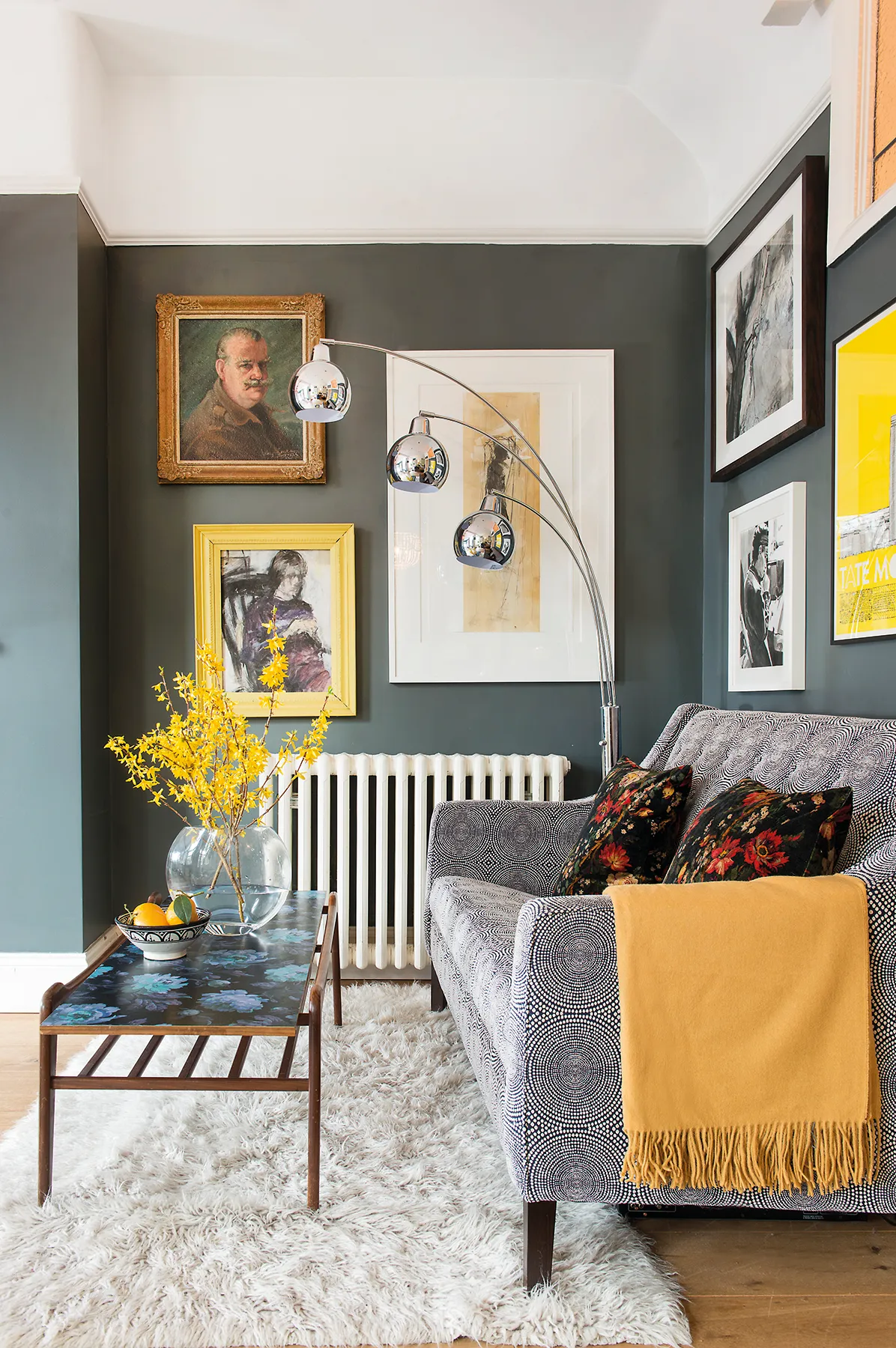 Colourful accessories brighten up the snug’s comfy grey sofa, which came from Sofa Workshop. The striking retro floor lamp – an original American design – was a great-value find at the local Southgate Auction Rooms