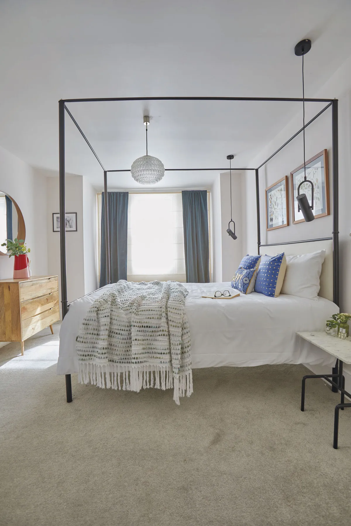 To add personality to the bedroom, Shrez has dressed the bed in beaded cushions by Oliver Bonas and a linen throw from HomeSense. She chose a roomy chest of drawers from Swoon Editions and hung the Stockholm mirror from IKEA above it
