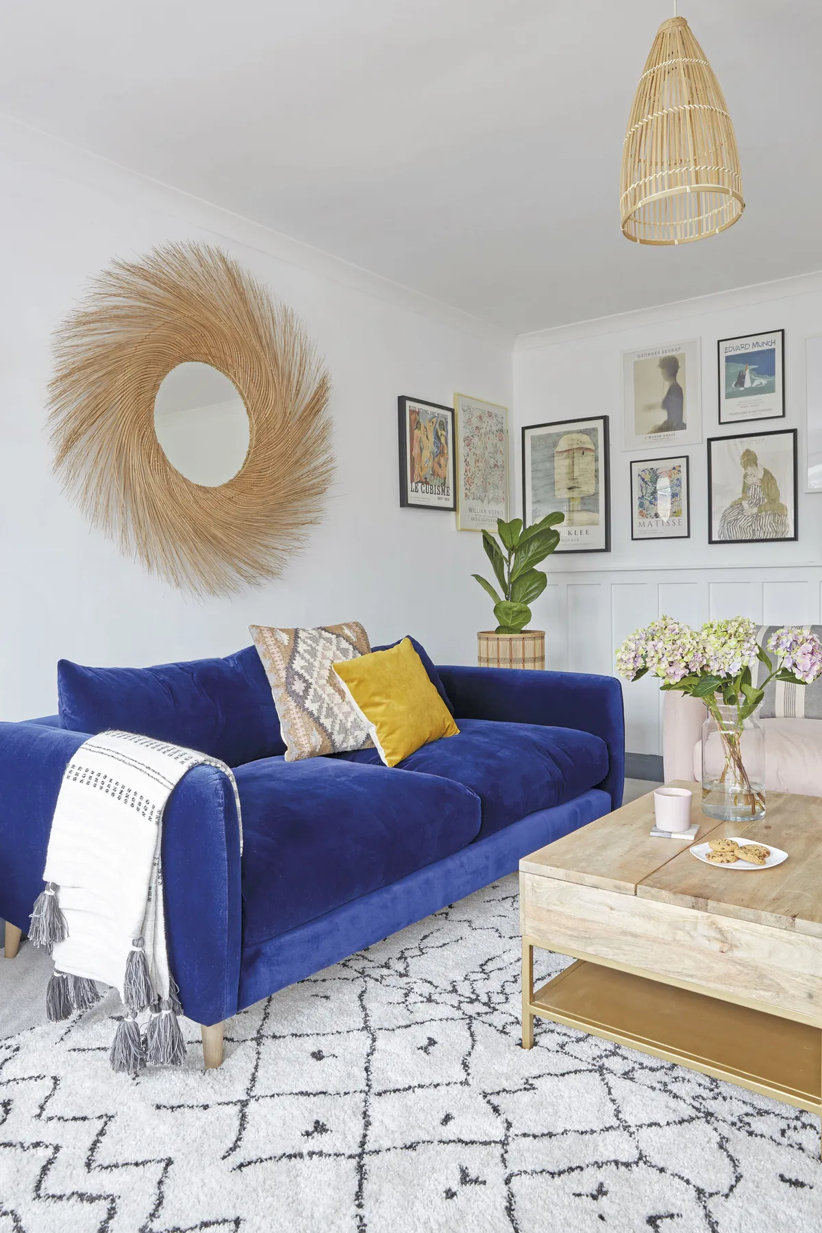 ‘This is one of my favourite rooms and I love the sofas in here. They’re from Loaf and our dog Jenson is banned from going on them! This room is really calming so I come in here with a cuppa to relax after work. The big mirror from Anthropologie is one of my favourite buys’
