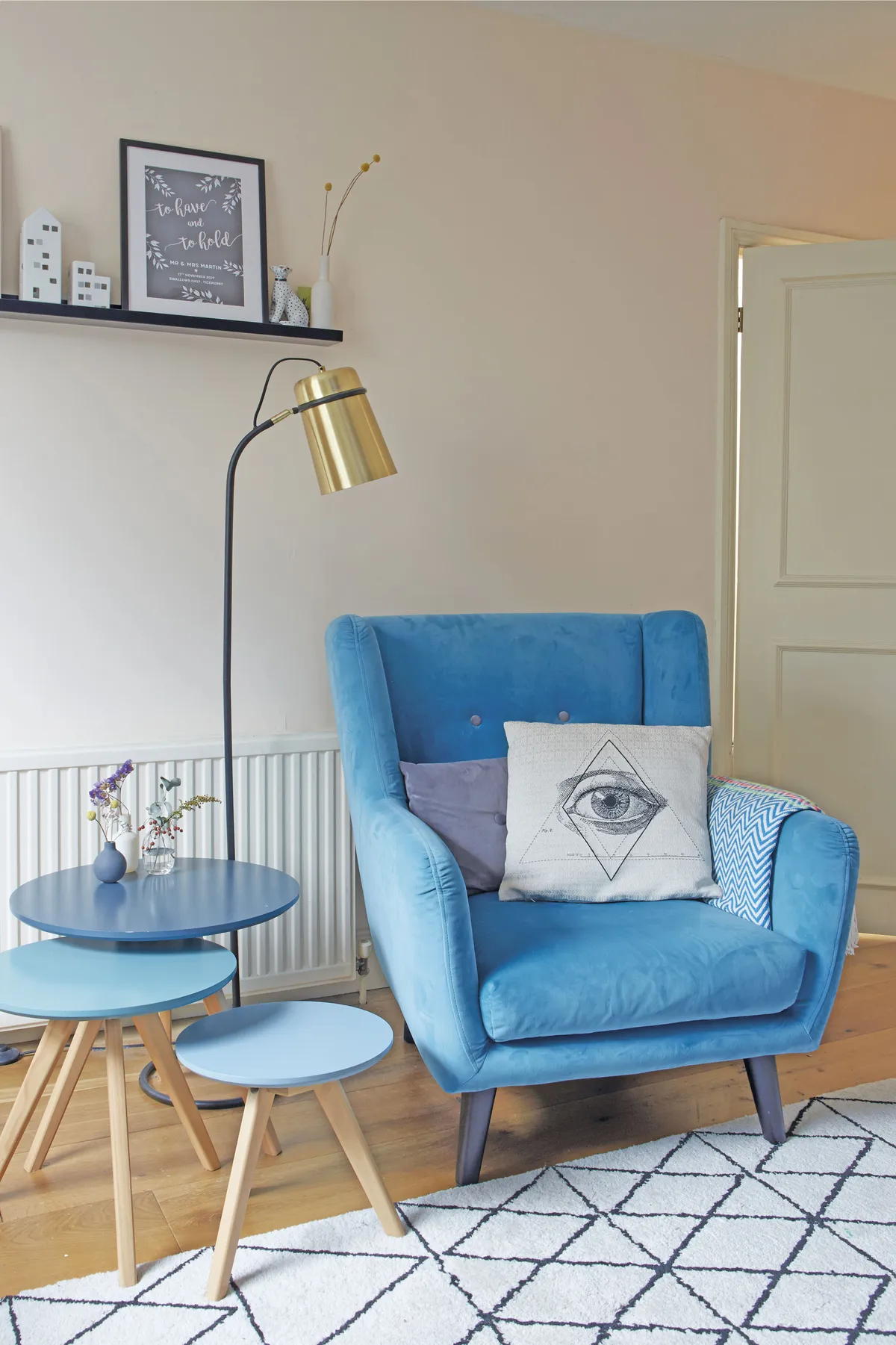 Emily’s love of blue continues with a nest of tables from Made.com and a turquoise armchair. ‘After purchasing our grey sofabed, we knew we could go a little wild with our choice of armchair. We visited Sofology to test out a few and this one ticked all the boxes – bright, velvet and comfy’