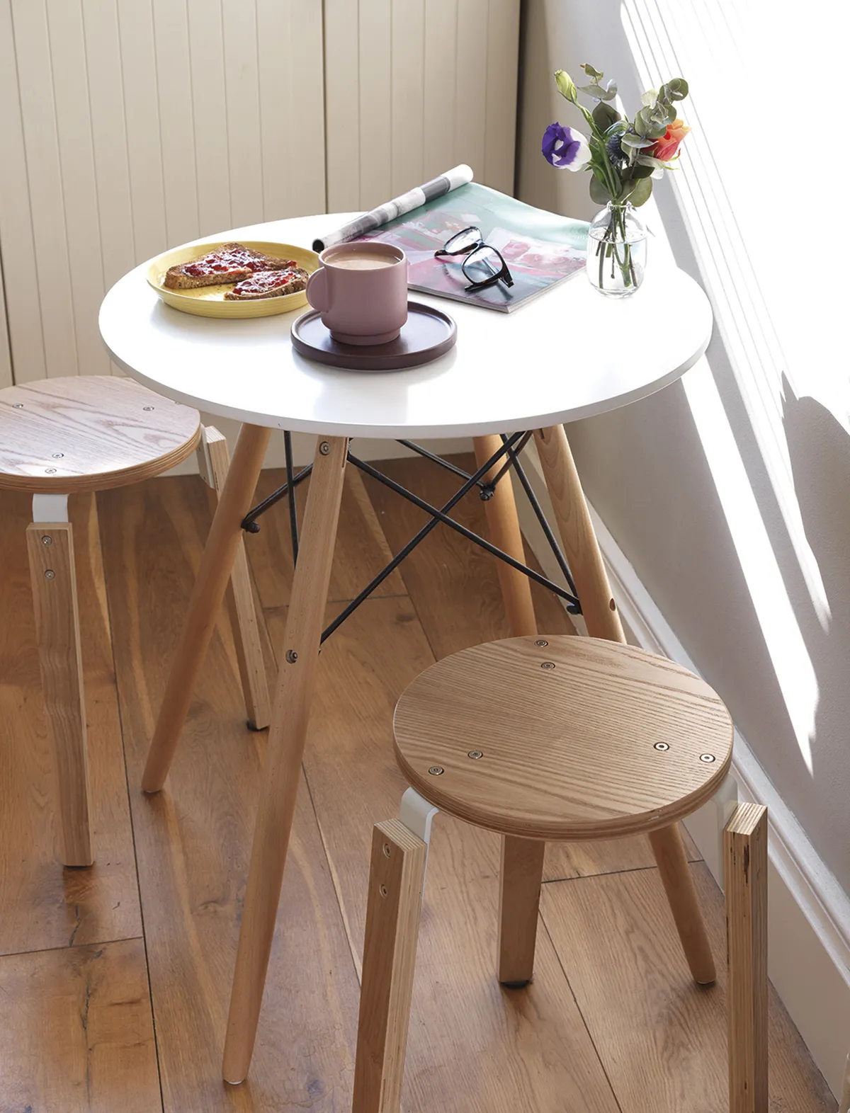 ‘I bought this little bistro table before we moved in. I saw it had been reduced at Cox & Cox so snapped it up. I love sitting here, enjoying a coffee and reading through the papers at the weekend, with the sun streaming through the window,’ says Emily