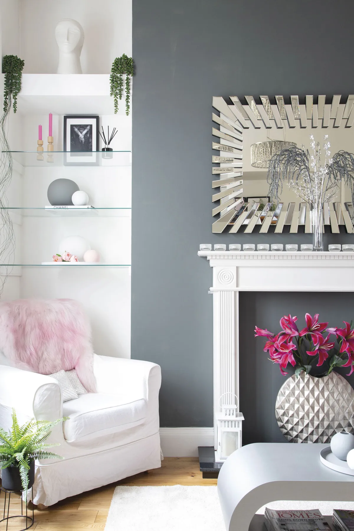 Lesley’s pared-back white and grey palette in the living room allows her to get creative with artwork and accessories