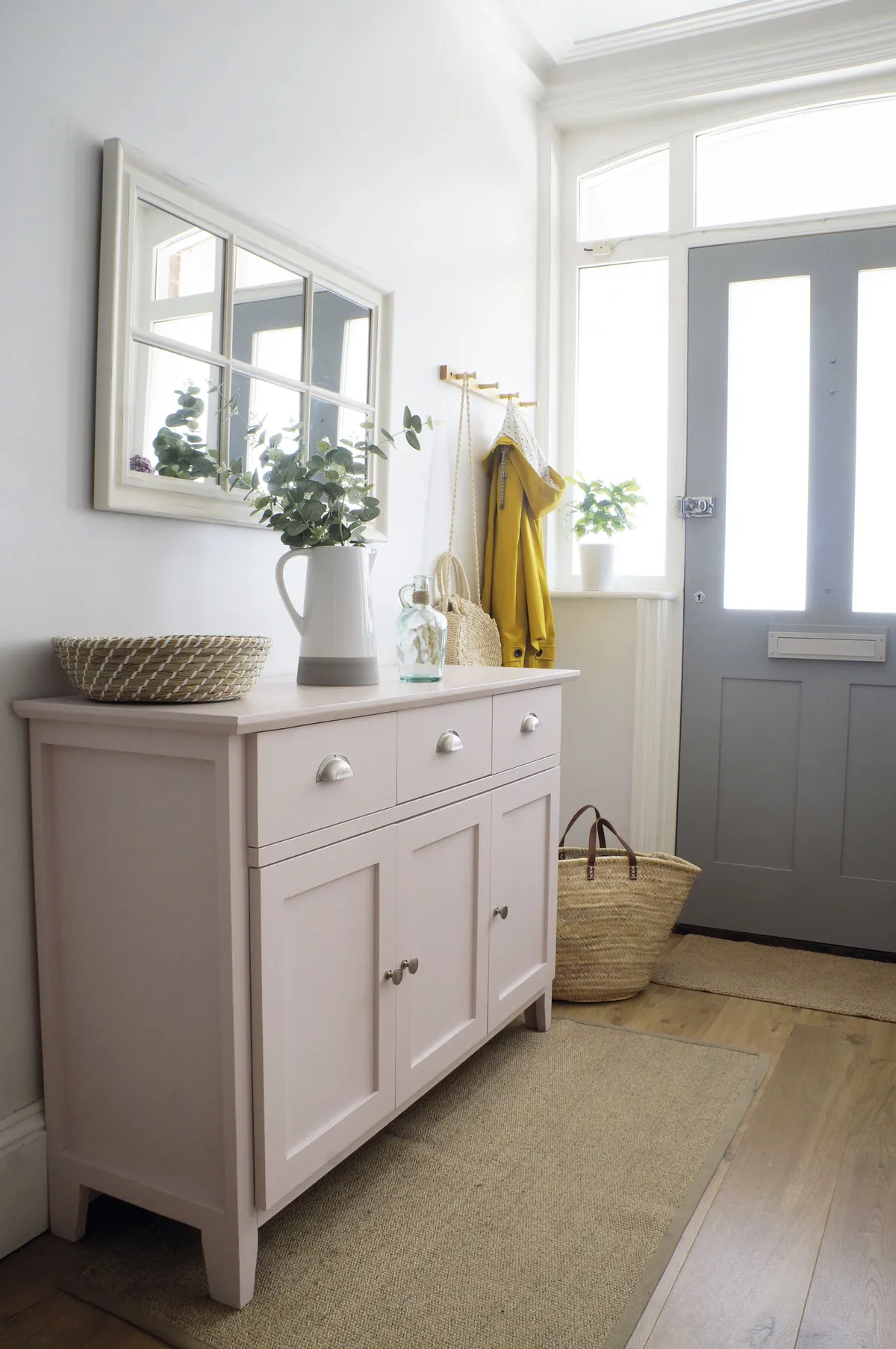 ‘The staircase and large hallway are what sold the house to me, so I wanted to keep them light and bright to emphasise the space,’ says Jade. ‘The pink sideboard is one of my favourite pieces of furniture. It cost £30 on Gumtree and then I upcycled it.’