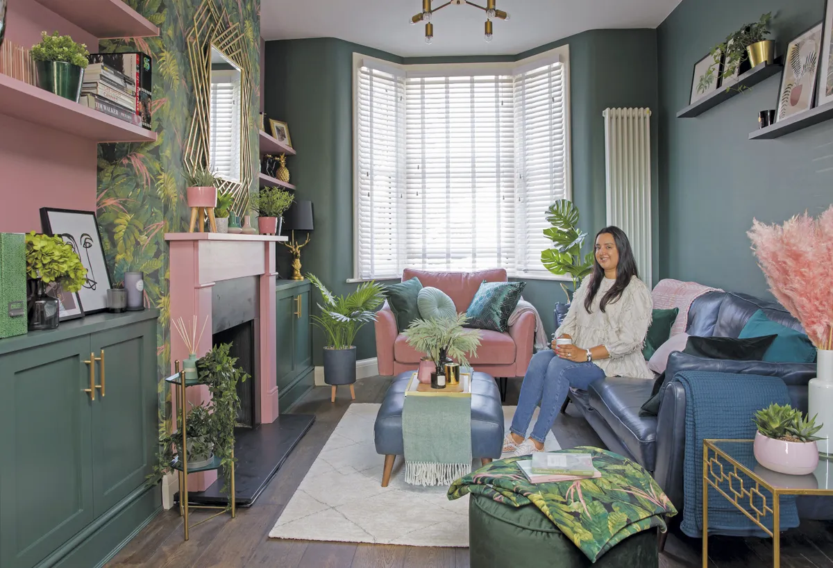 Miriam chose a deep green and blush pink colour scheme with tropical prints to give her living room a much-needed personality boost