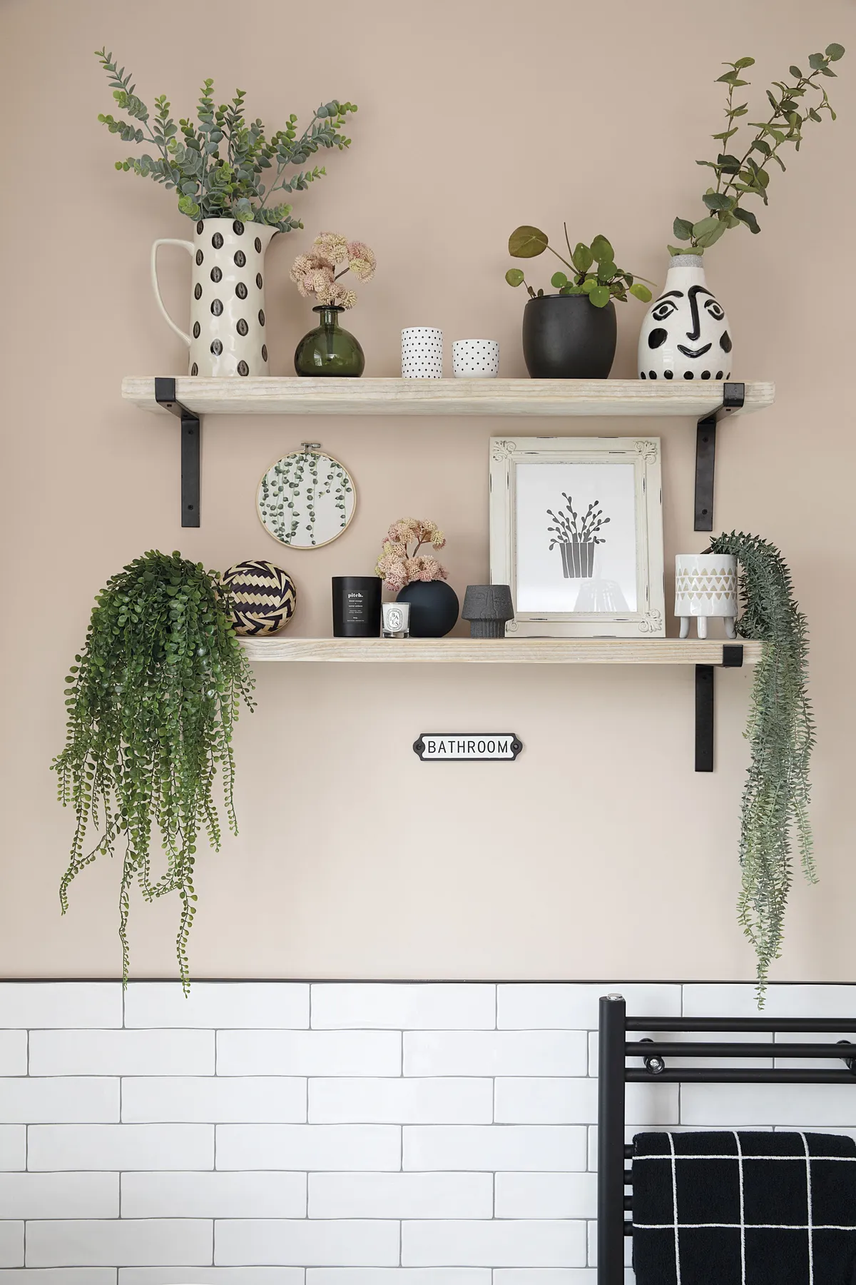 Stylist Liz loves spending time rearranging her shelves with different vases, plants and prints to keep the scheme looking fresh