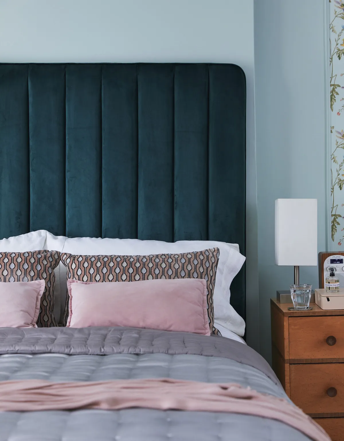 Add a headboard to instantly turn a basic bed base into a feature. Beverley re-upholstered an existing headboard, but you’ll find plenty of similar designs online at Wayfair or Very