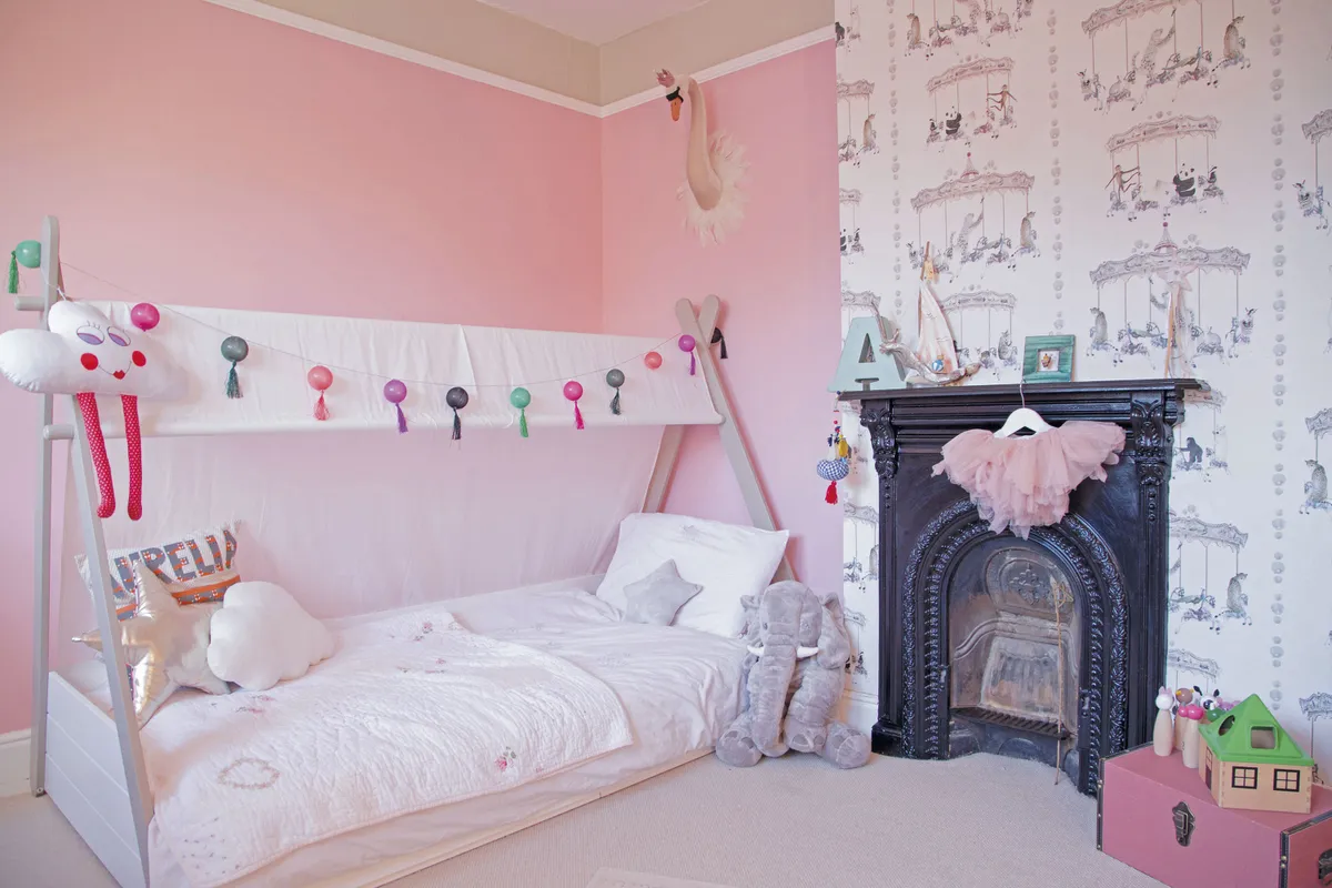 With a baby pink colour scheme and fairy tale-style decorations, Aurelia’s bedroom is every little girl’s dream