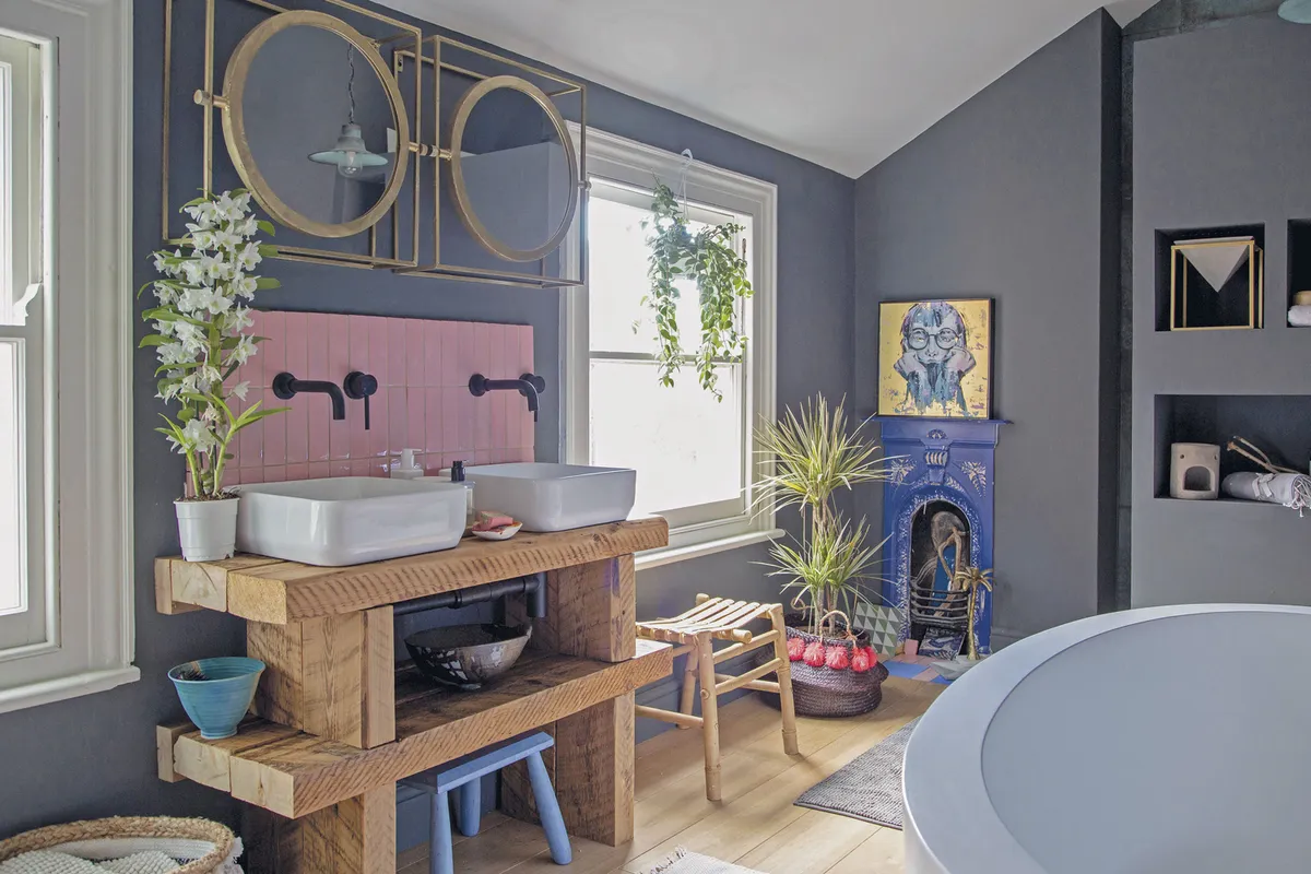 ‘Our builder made the shelves that our basins sit on using the old loft struts,’ says Megan. ‘So many people compliment us on them! The gorgeous, glossy pink tiles are from Bert & May,’ Megan shares. ‘It took hours of internet trawling to find the perfect tile in the right hue, but it was so worth it for the finished effect’