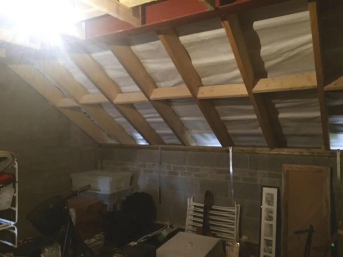 Before renovation, Anne Marie's attic was a dark, unused space