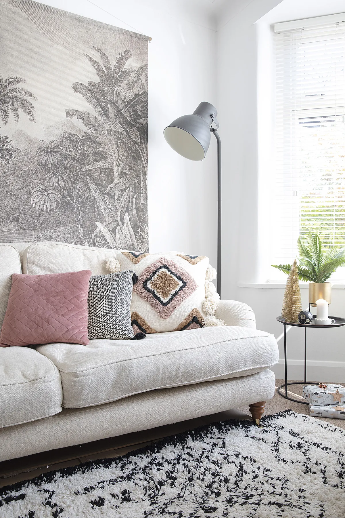 ‘The wall hanging from Love Frankie is a great alternative to wallpaper as it still creates a big pattern on the wall but can be moved around,’ Louise says. ‘I’ve added monochrome touches like the side table from Maisons du Monde and diamond pattern cushions from H&M Home’