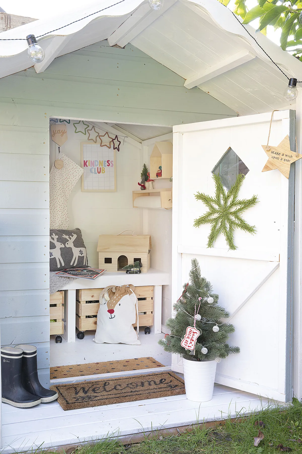 ‘Building this flat-pack playhouse was our lockdown project as a joint birthday present for the kids,’ Louise reveals. ‘The storage bench doubles up as a desk or seat, and underneath I added castors to IKEA crates. I love dressing it up to create a little grotto at Christmas.’ The Kindness Club print is from Etsy shop Minii and Maxii