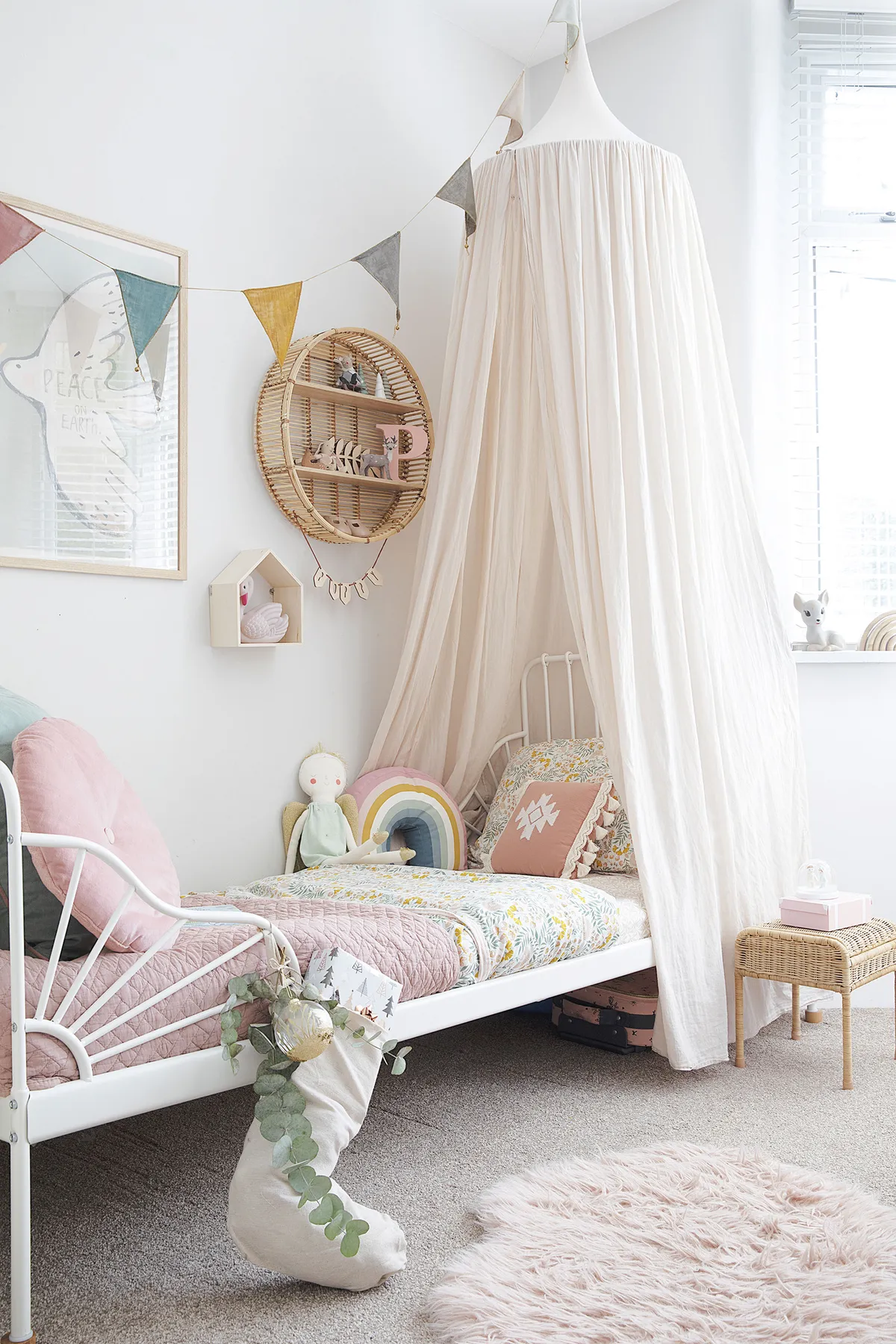 A pretty canopy from Molly Meg creates a fairytale-feel in Poppy’s bedroom, which also features rattan shelves from Matalan. ‘The cute little stool is ideal for hiding stuff from her brother,’ Louise says