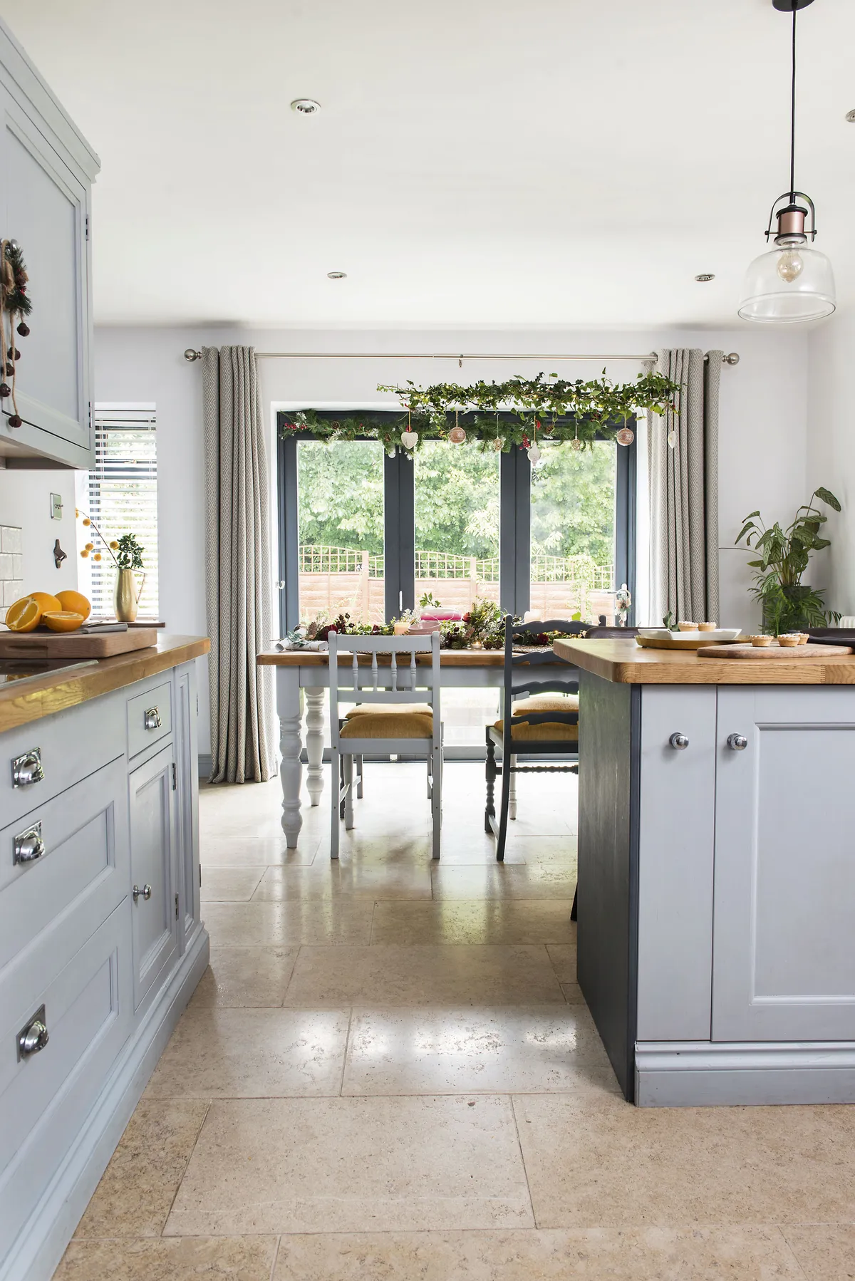 Although the kitchen is second-hand, it’s a handmade, bespoke wooden Shaker-style design that the couple painted in Denali by GoodHome at B&Q. ‘We did have to buy a few extra units and door fronts’ says Amy. ‘My dad built us a lovely pantry cupboard as well’