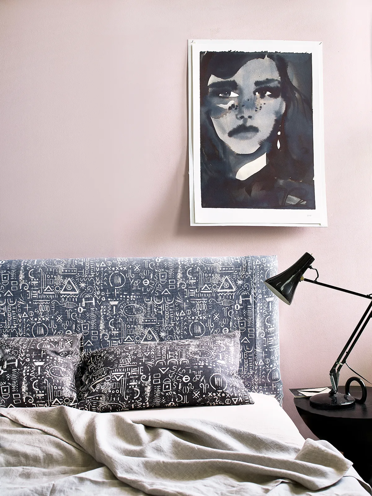 pink bedroom ideas - pink walls and black and white artwork 