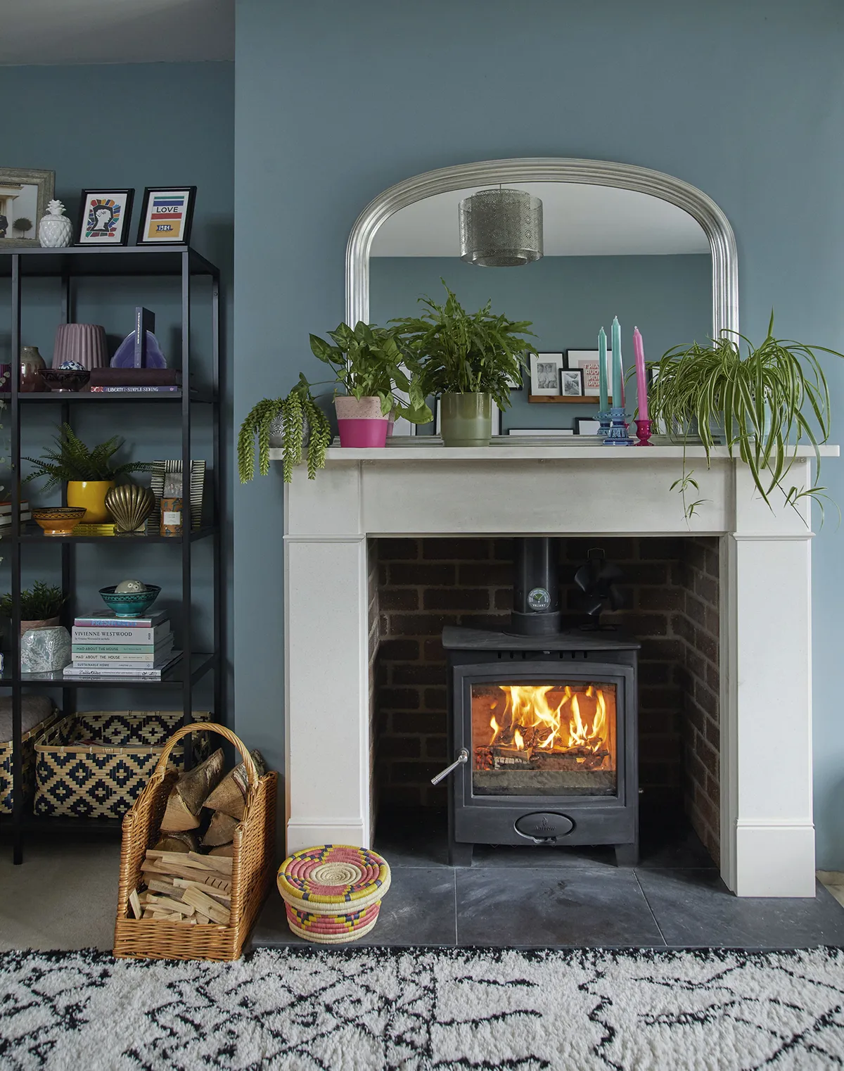 ‘I like to support local businesses where I can, so I chose this simple, classic stone surround from a place near us called Lower Barn Farm. It reminds me of the fireplace in my mum’s period property, but it also works well in this modern room’