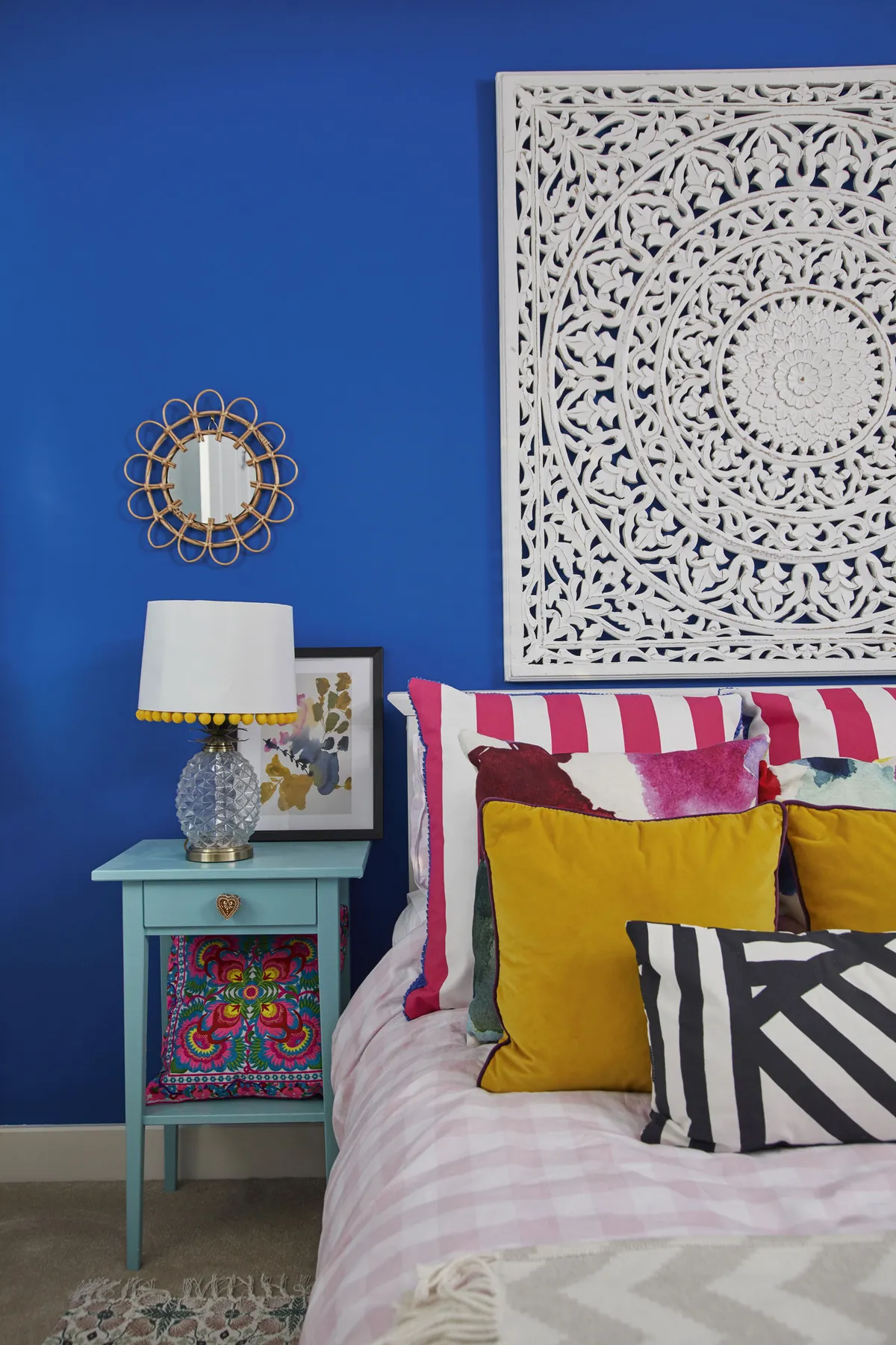 ‘I love a good clash of colour and pattern – no room is safe!’ says Sarah