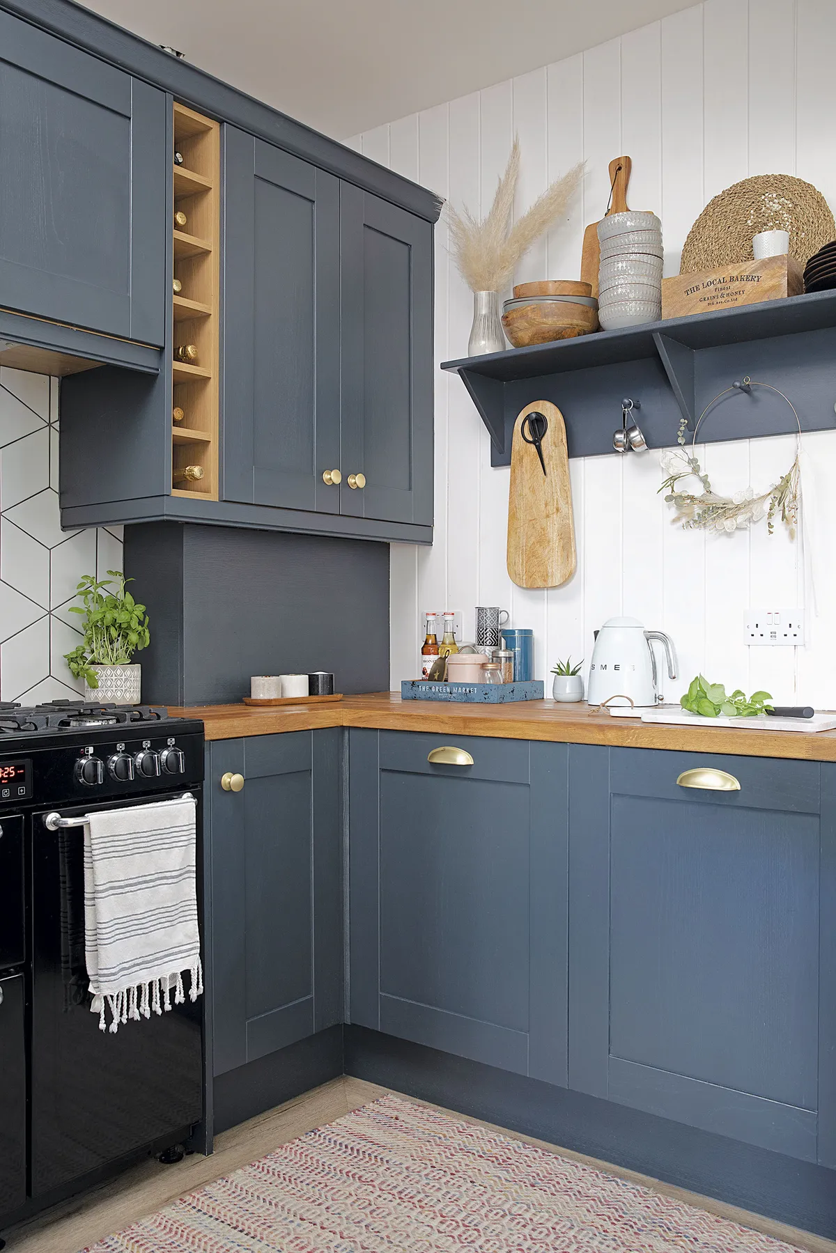 ‘Having moved here from a bigger house, we had to be clever with storage solutions so we went for taller-than-standard wall units,’ explains Laura