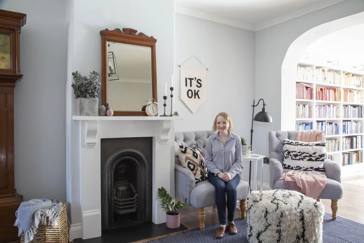 Craving a calm, cosy space, the couple chose muted hues for the living room, and accessorised with pastel pink and navy touches to add depth and link to the décor in the rest of the house