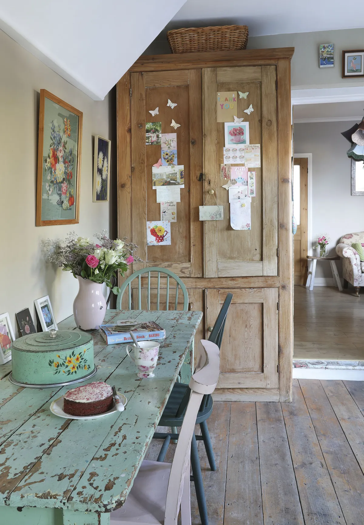 Hildah has created a welcoming dining area without breaking the bank by accessorising preloved furniture with cherished keepsakes. ‘I love the green cake tin, which I picked up from an antiques shop in Ohio, when I went to visit family,’ says Hildah. ‘The kitchen dresser came from a manor house. It was my best and biggest eBay buy – I had to arrange for it to be delivered and it nearly didn’t make it inside due to its massive size!’