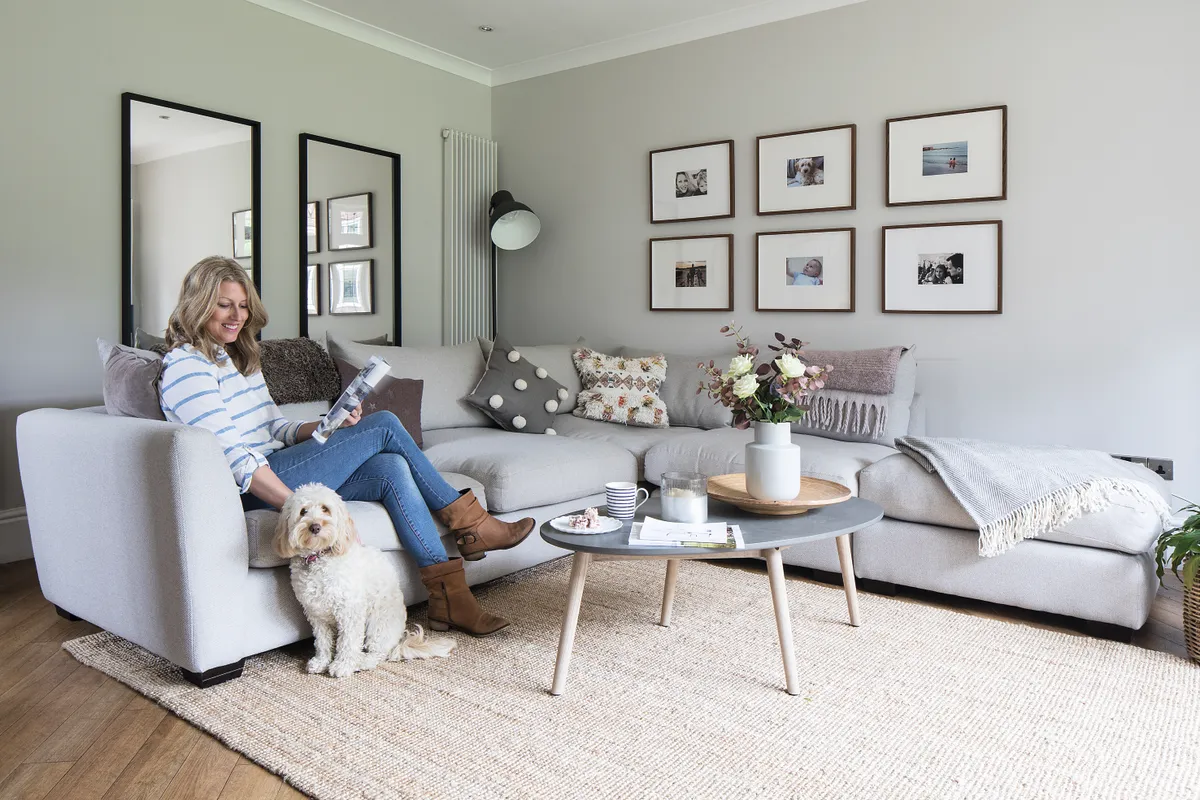 Joanne's living room has the Floyd corner sofa from Barker and Stonehouse and is anchored by an IKEA rug