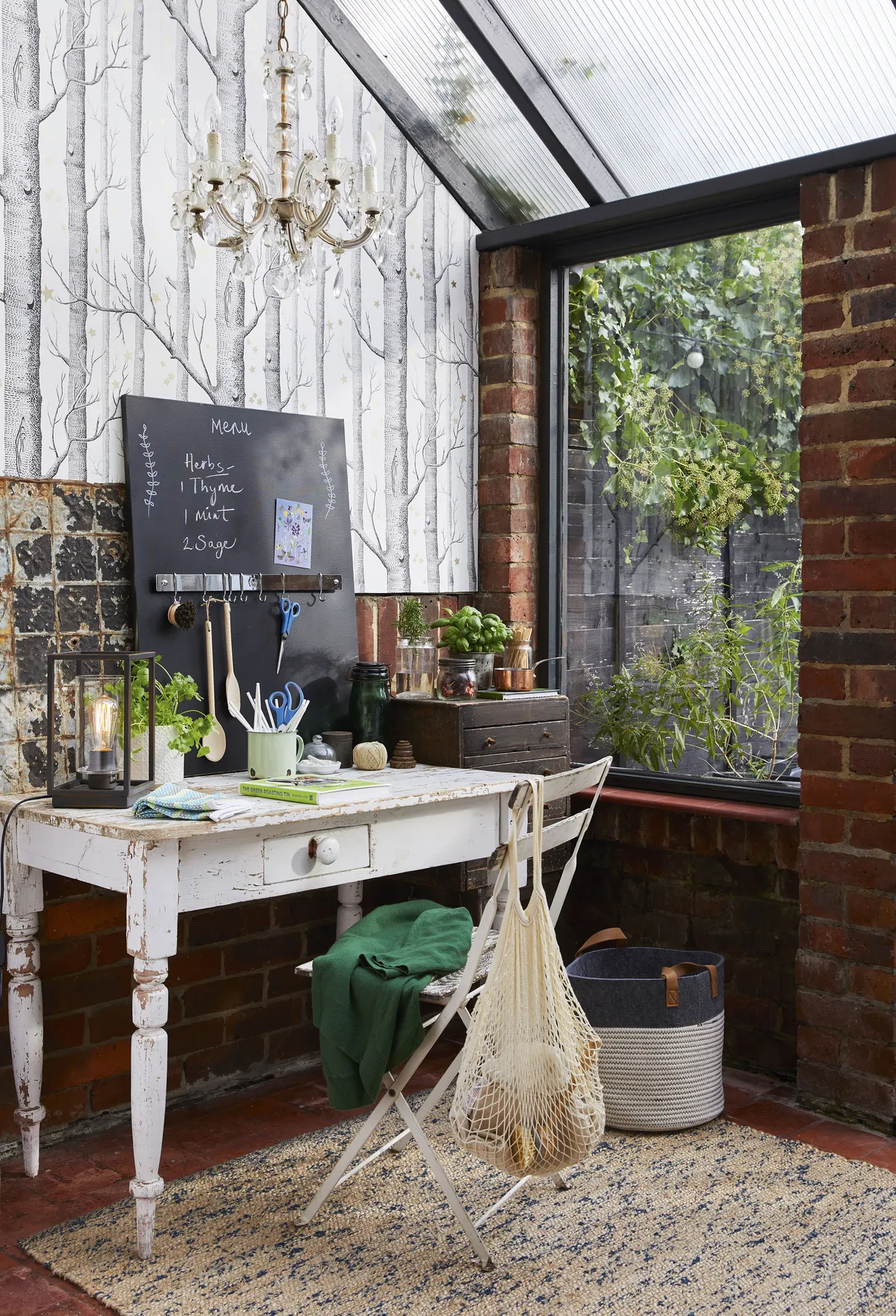 A clever mix of recycled and online bargain buys has helped transform a damp and dreary lean-to into a characterful office space, overlooking the garden. Kiara only needed a single roll of designer wallpaper to cover up an unattractive section of wall and give her new-look room an injection of print and character