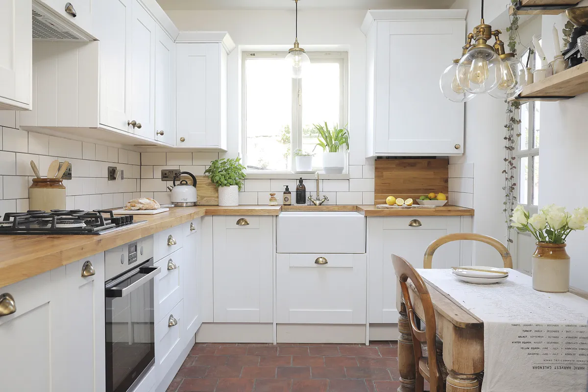 ‘At first, I wanted a dark blue kitchen, but soon realised it wouldn’t work in a small space. I’m really glad I changed my mind as I love the white’