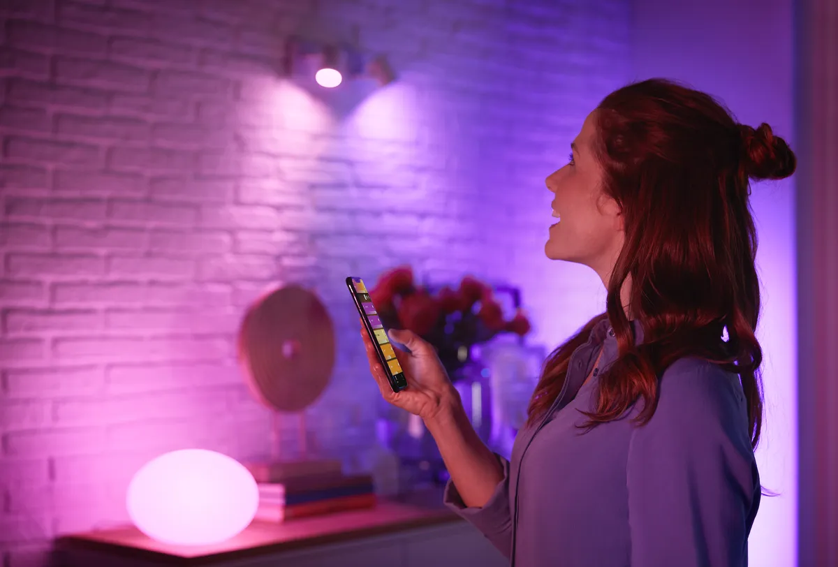 Change up your lighting to suit your mood with help from Philips Hue’s smart technology systems. Fugato double spotlight in white, £149.99; Flourish table light, £119.99, both Philips Hue