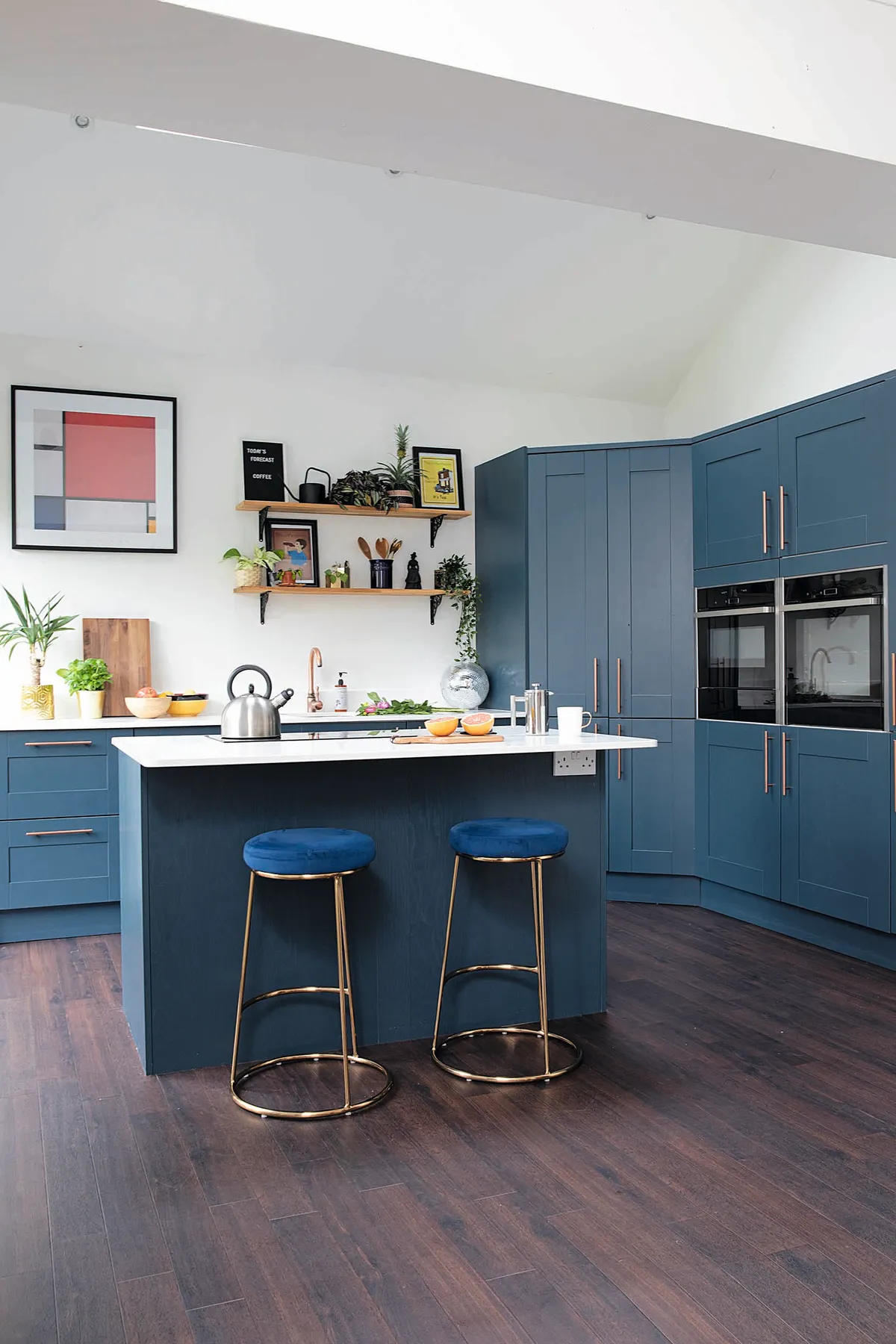Velvet and gold Dunelm stools feature in Rachel's converted kitchen