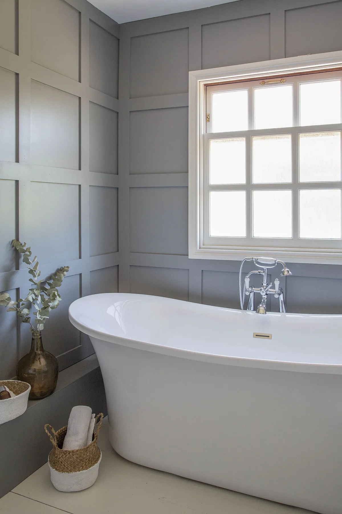 Panelling in moisture-resistant MDF and a free-standing tub give the bathroom a opulent look for less. ‘It’s like I’ve stepped into a luxury hotel every time, and feels even better knowing we did it on a tight budget,’ reveals Vicky