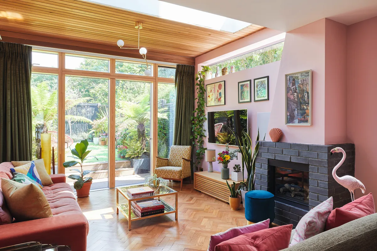 ‘One of the main focal points in here is the fireplace, which I designed myself,’ says Bo. ‘I love the reclaimed parquet floor and the fact that all the electrics are fixed into the walls so there’s no trailing wires.’ The corner lamp is from eBay and the flamingo is from an antiques shop in Hampton Court