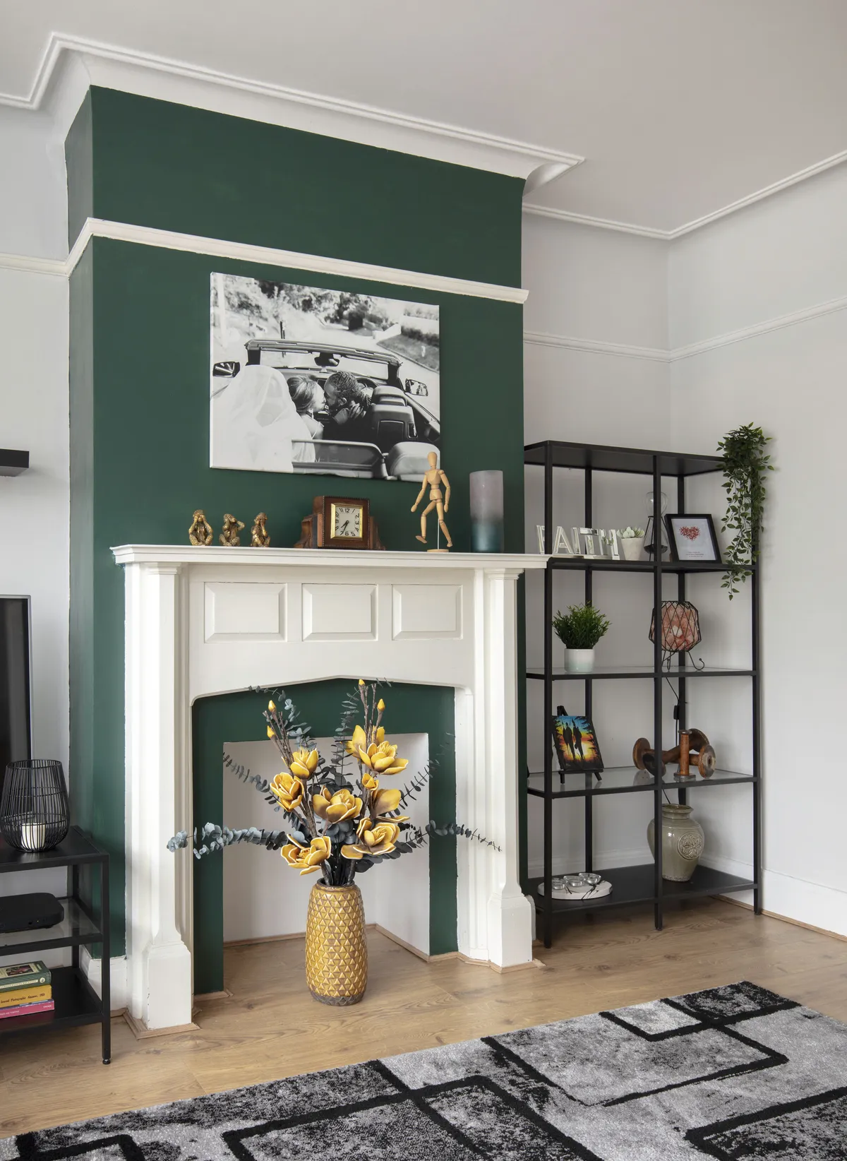 Diandra painted the chimney breast in Racer Green from Dulux, and added a canvas print of the couple in their wedding car. ‘This original fireplace was one of the reasons I fell in love with this house,’ she explains. ‘We’re saving up to put in a working fire one day’
