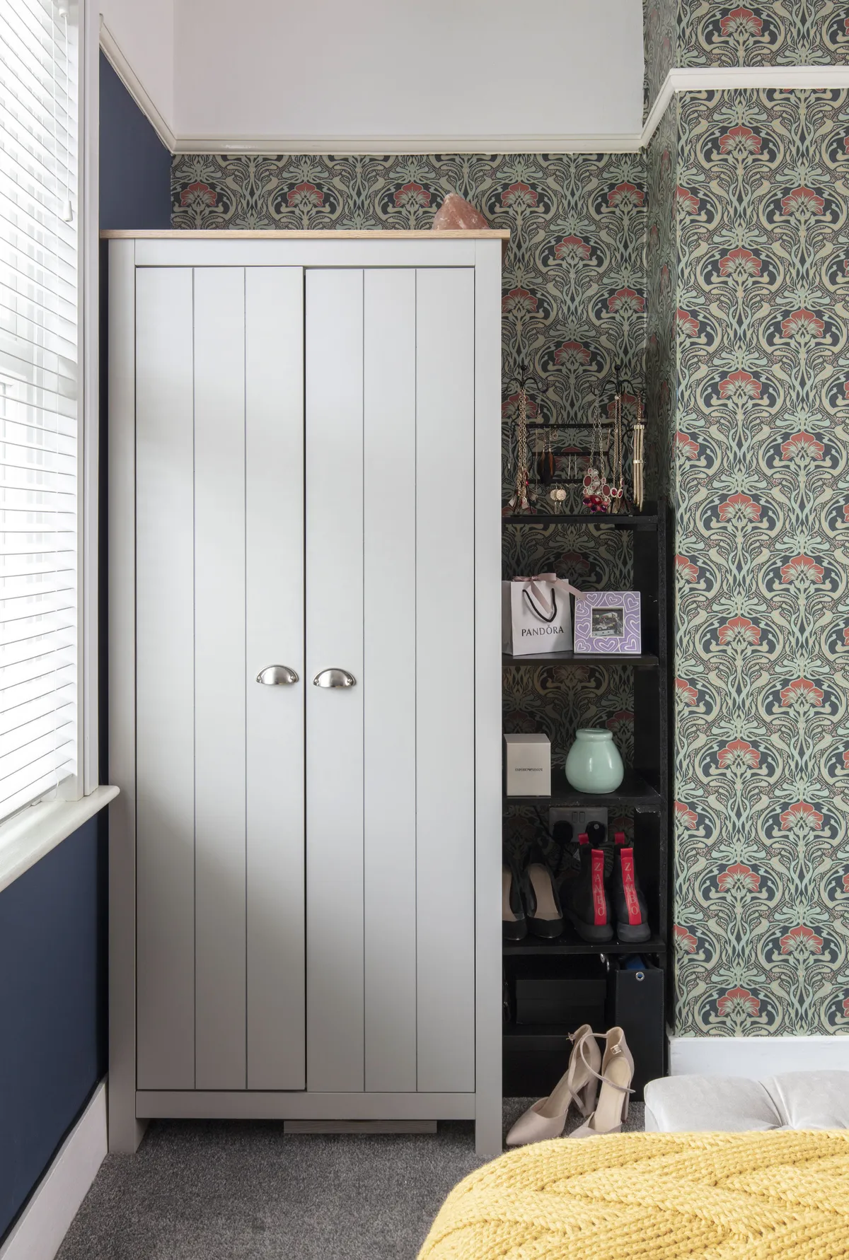 To contrast with the bedroom’s navy walls, Diandra chose a Flora Nouveau Peacock print from Dunelm for her first go at wallpapering. ‘We chickened out of using it in the living room,’ she says. ‘But in here I felt we could be a little braver with pattern’