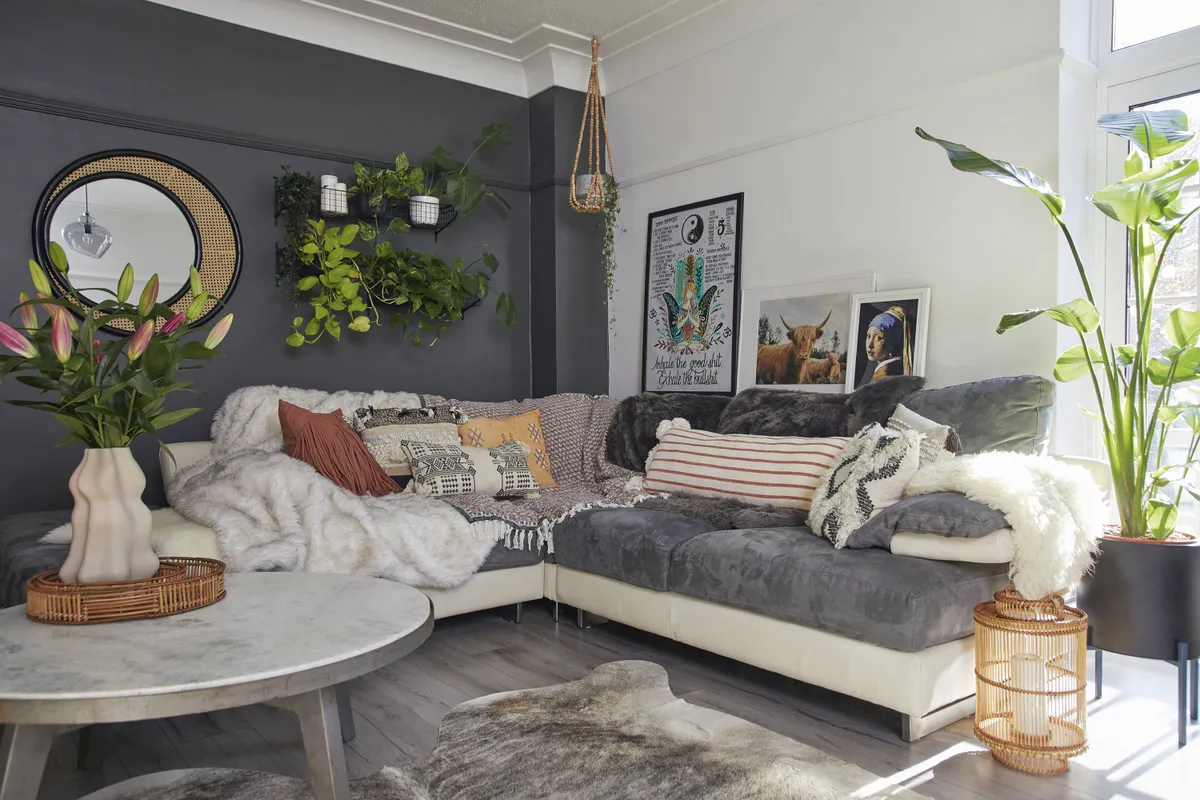 ‘I choose my prints for the look first and foremost, and then I’ll hunt for a spot to put them in, though I do move them around a lot. The rattan mirror is from MADE.com and the coffee table is from French Connection’
