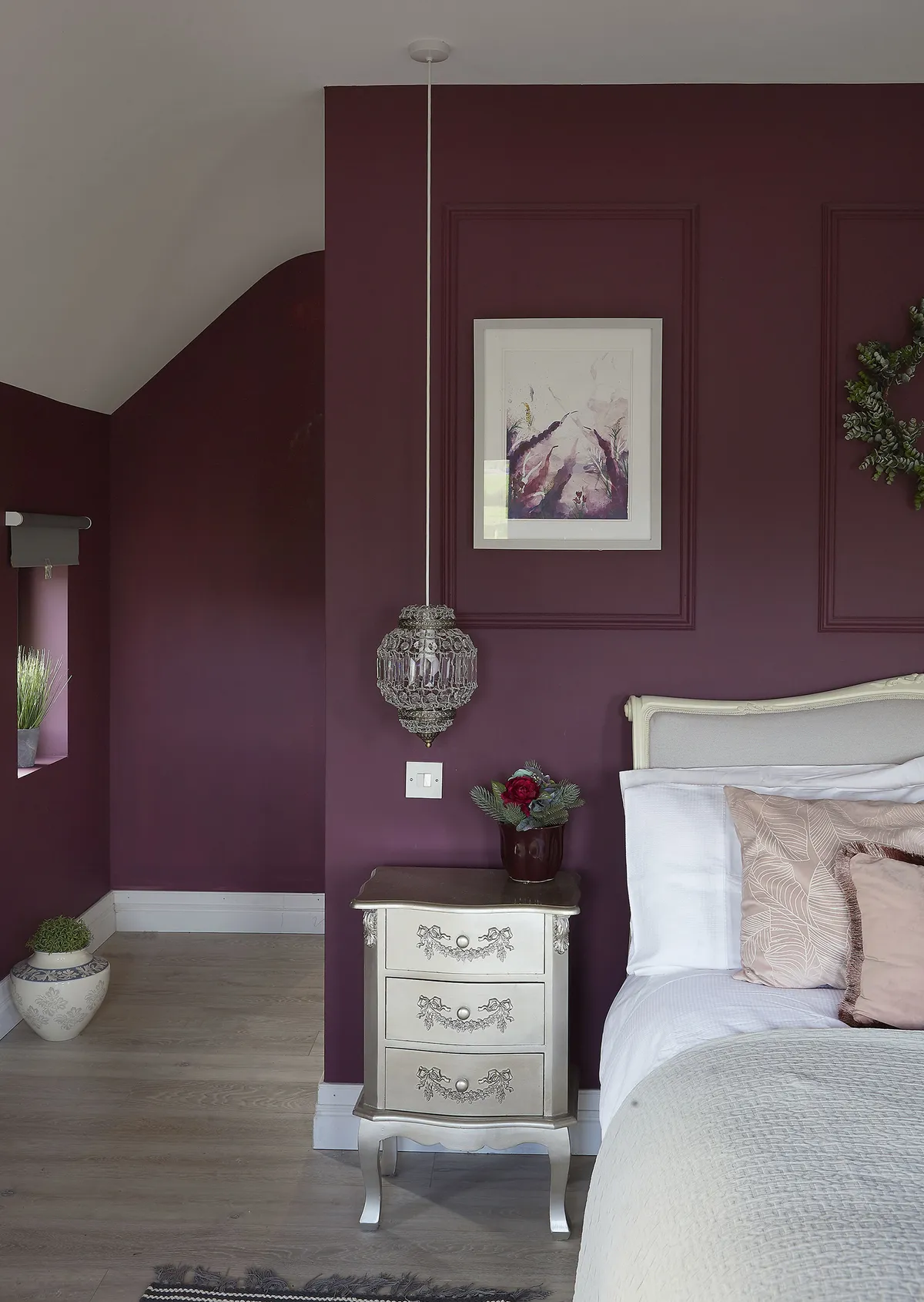 Inspired by the panelling created by Seamus in the main bedroom, Gillian chose ornate furniture and glass pendants to create a period-inspired look