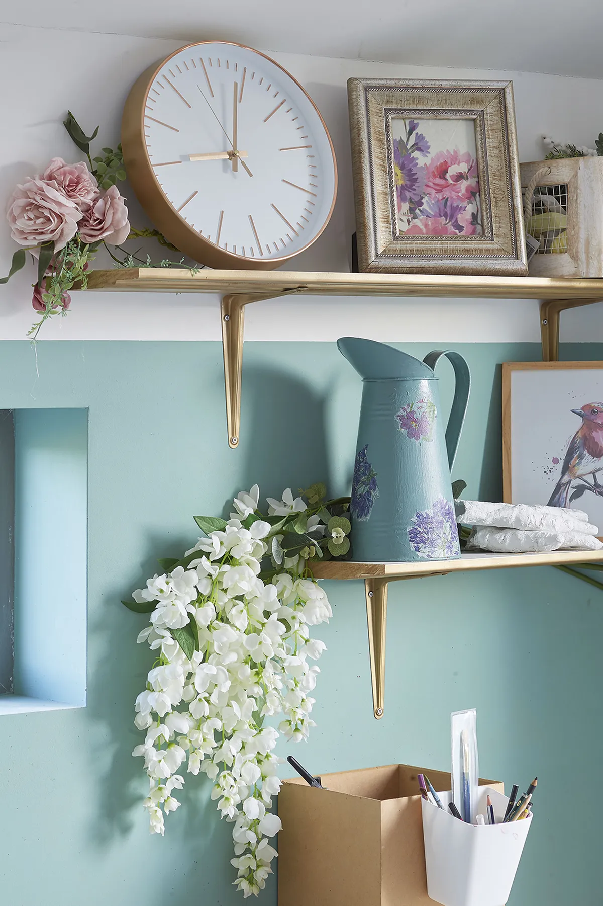 As the house is built on a farm plot, Gillian pays homage to farmhouse living with country chic accessories like this sweet metal jug adorned with flower motifs
