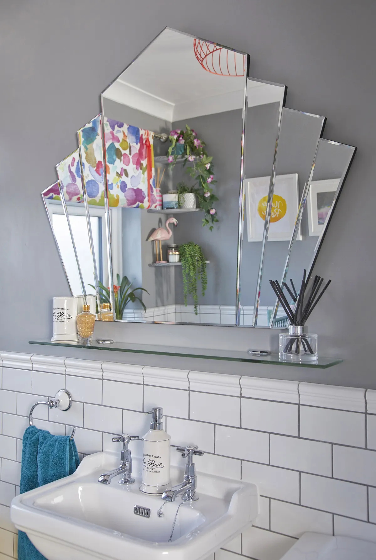 ‘I already had this art deco-style wall mirror from Dunelm, and it’s finally found its pride of place in this room. The glass shelf fits perfectly underneath and is useful as an extra bit of storage’