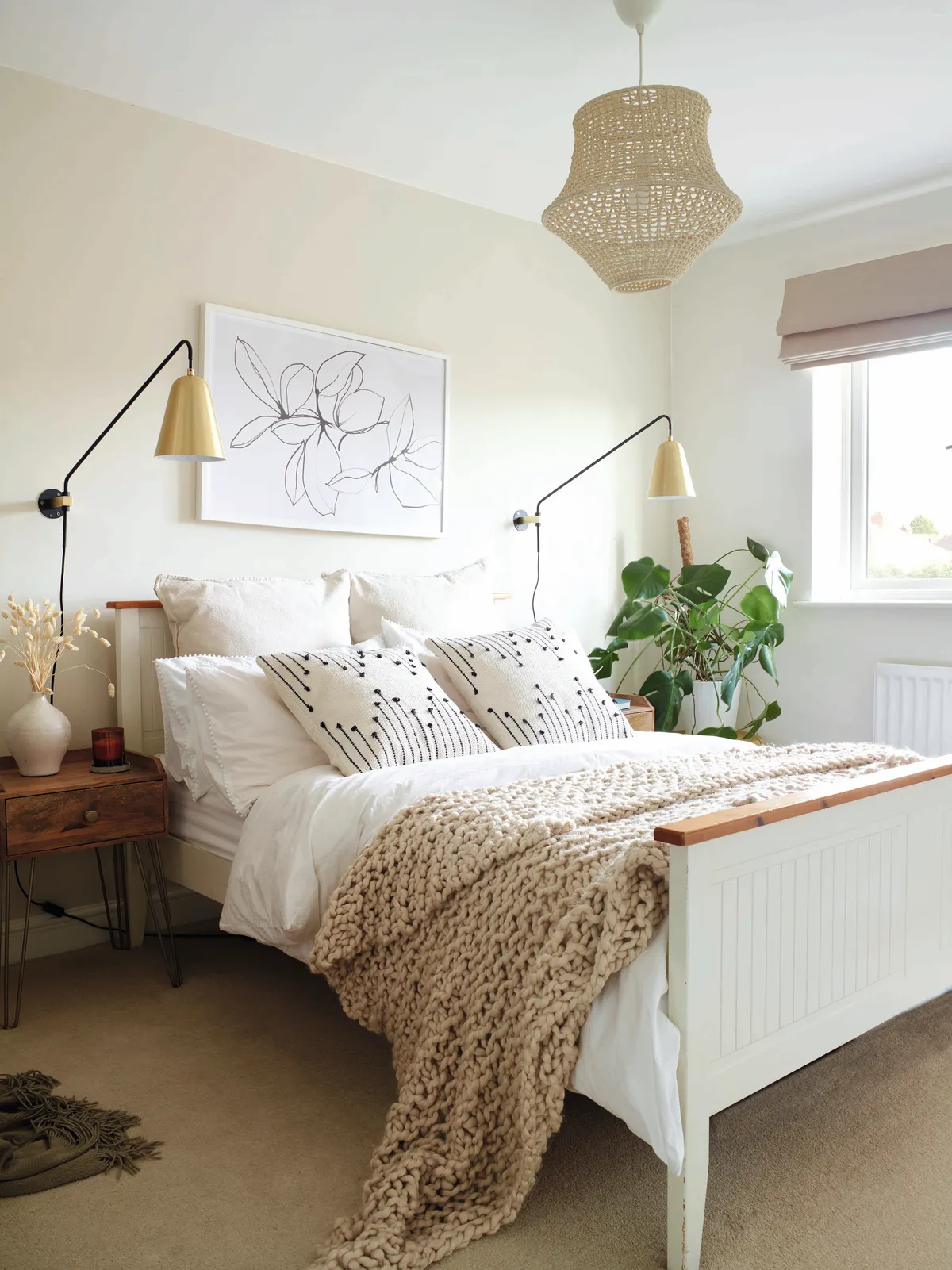 This calm and collected bedroom has been painted in fresh, warm tones while a pair of statement lamps from Lamp and Light bring drama to the room. ‘They make great reading lamps,’ says Melanie