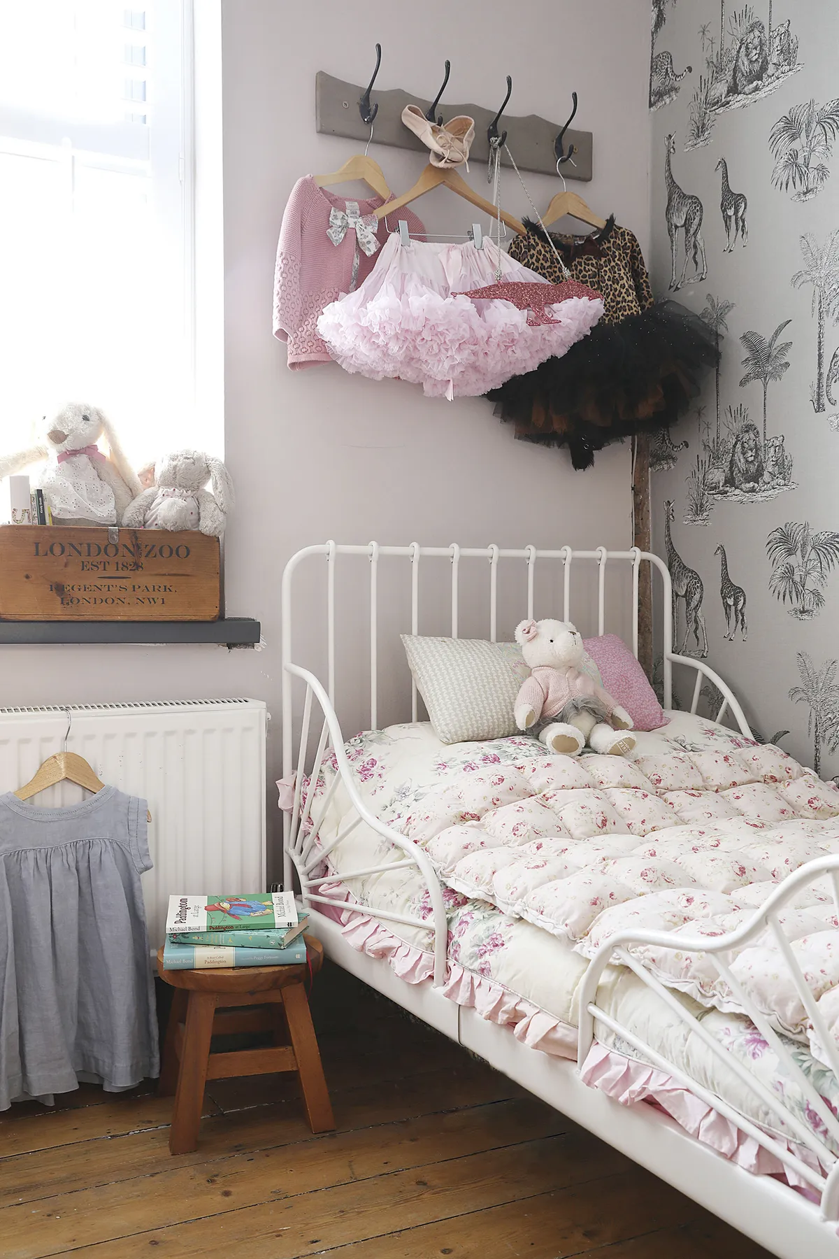 ‘The Cole & Son wallpaper was one of my biggest indulgences. It wasn’t cheap but I fell in love with it. Annie adores ballet so we’ve hung her tutus above the bed’