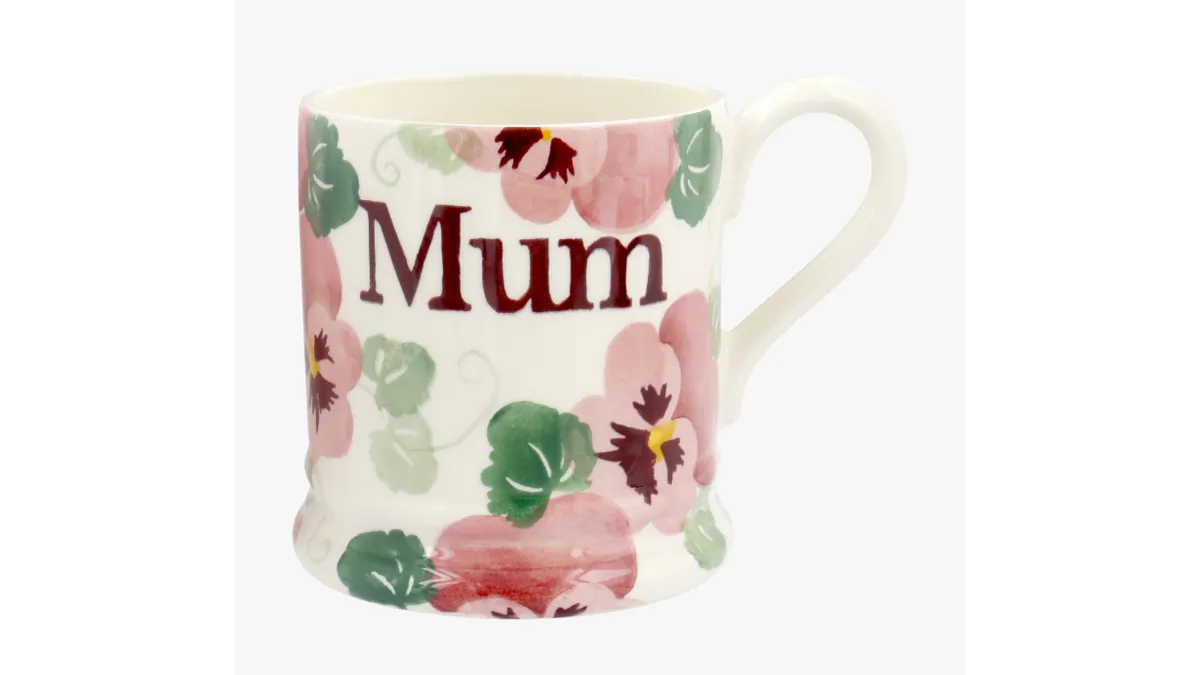 A mug with 'Mum' written on it and a pansy pattern.