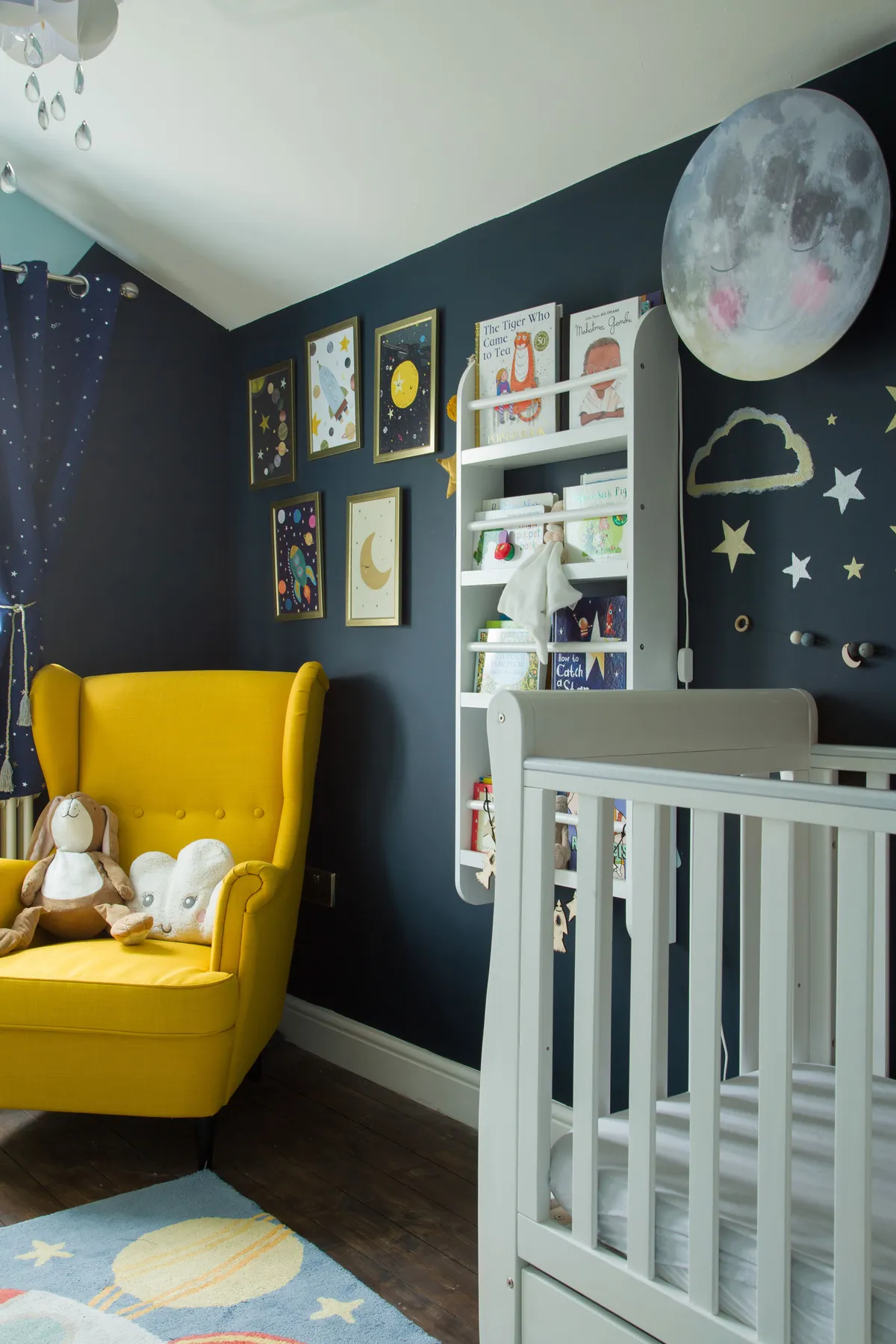Painting simple motifs on the wall is an easy way to add cute detail to a child’s room. ‘I love the wall mural,’ says Kate. ‘I painted it when I was heavily pregnant and used paints from Vintro for the stars and clouds’