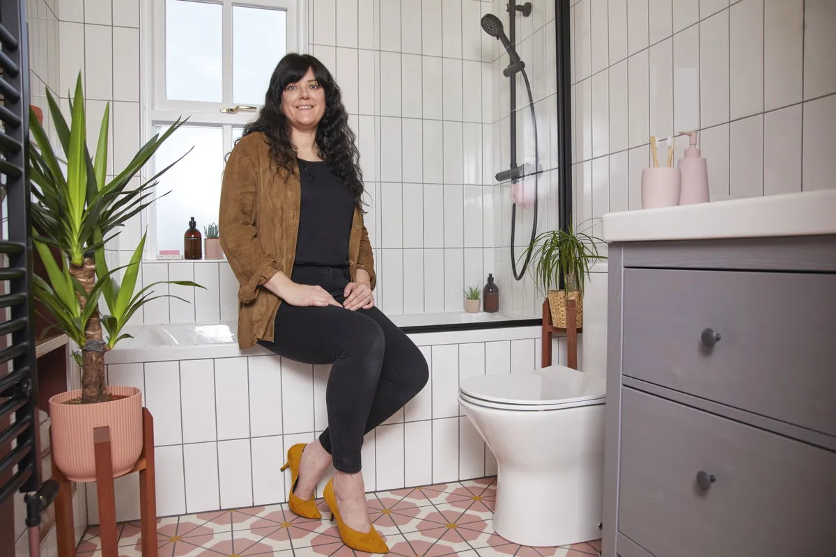 Although the bathroom is small, Lucy didn’t feel the need to hold back on style. She’s topped and tailed the room with colour and pattern, though the wall of white tiles helps add a feeling of space, and the simple furniture gives the room an uncluttered look