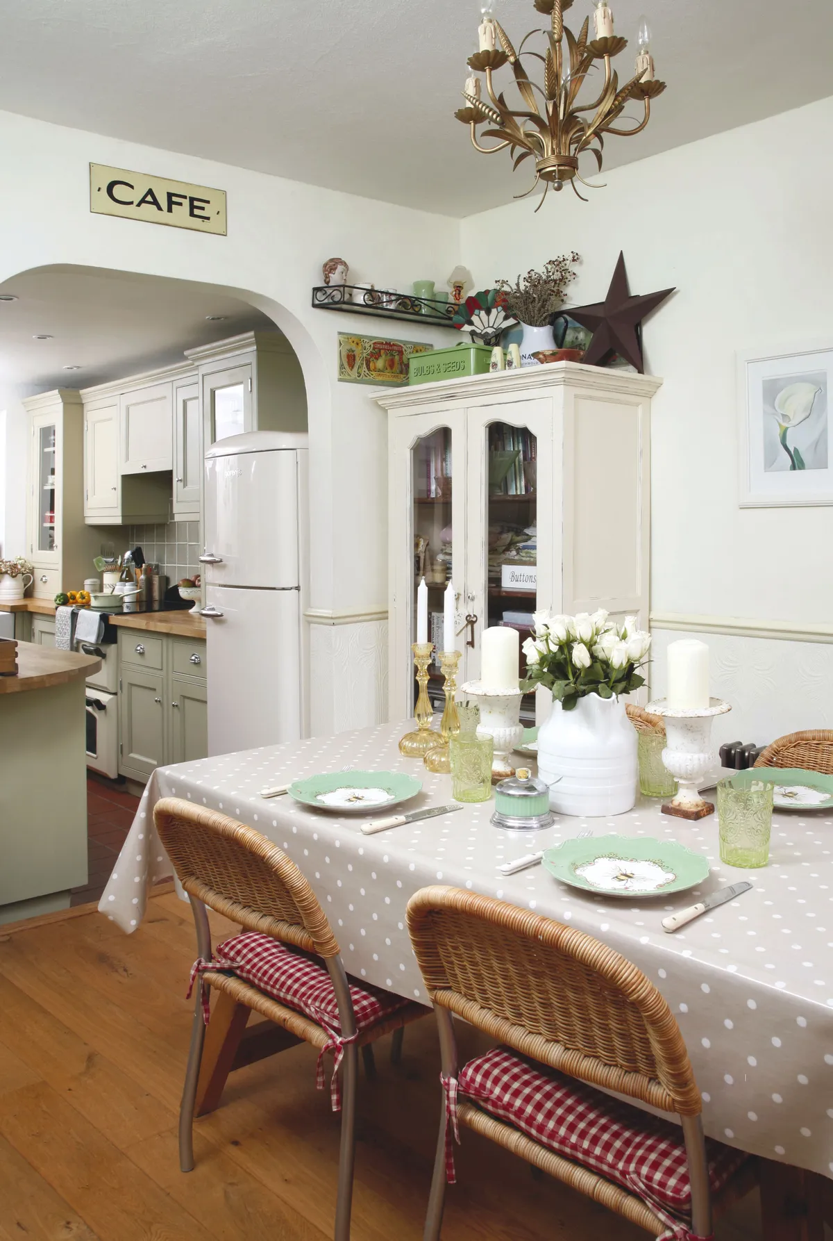 Louise has continued her pastel green and cream cottage theme into the dining room to create an airy interior with a sense of space