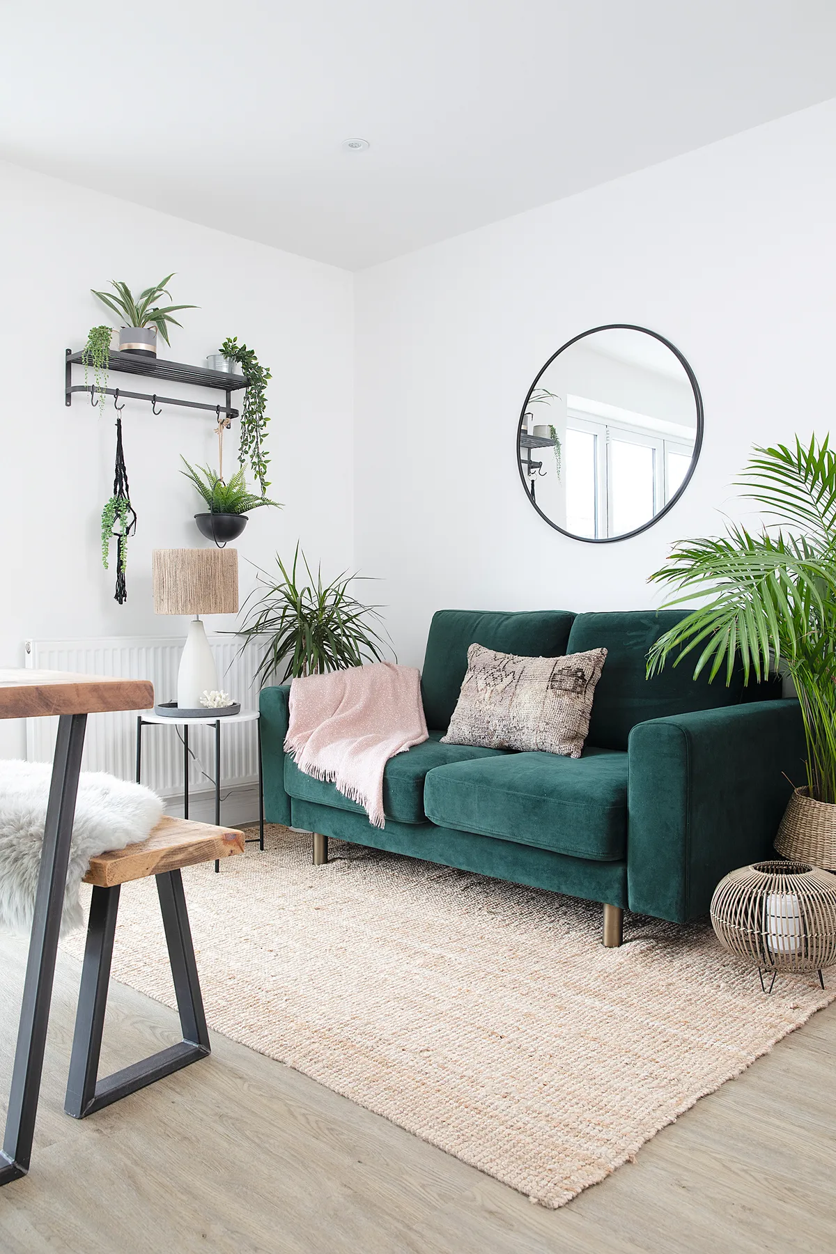 ‘I love our green sofa from Snug, as it pops against the white walls. The lamp was an upcycling project using paint for the base and jute twine around the shade. It works well with the natural textures of the IKEA rug and cushion from Bazar Du Sud. The shelf was an Aldi bargain at £10 but they sell similar in The Cotswold Co.’
