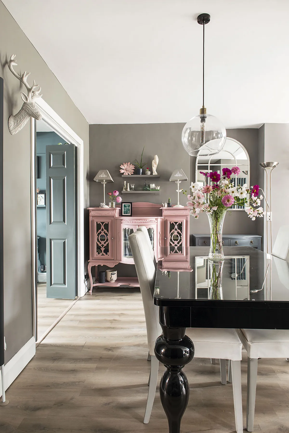 To keep costs down, Sarah designed her scheme around furniture she already owned. She brought the black table, won on eBay, and grey Next chairs, from her previous home and painted an existing cabinet in Farrow & Ball’s Sulking Room Pink to tie in with the island