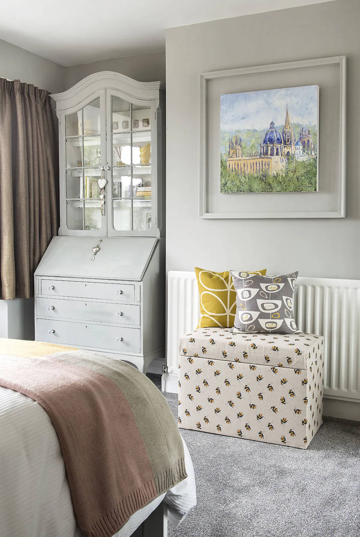 Ensure a guest bedroom has plenty of storage, as Sarah has with an old bureau, painted in Annie Sloan’s Pure White for a French farmhouse feel. She re-covered the Dunelm blanket box in a bee print to tie in with the nature-inspired details throughout