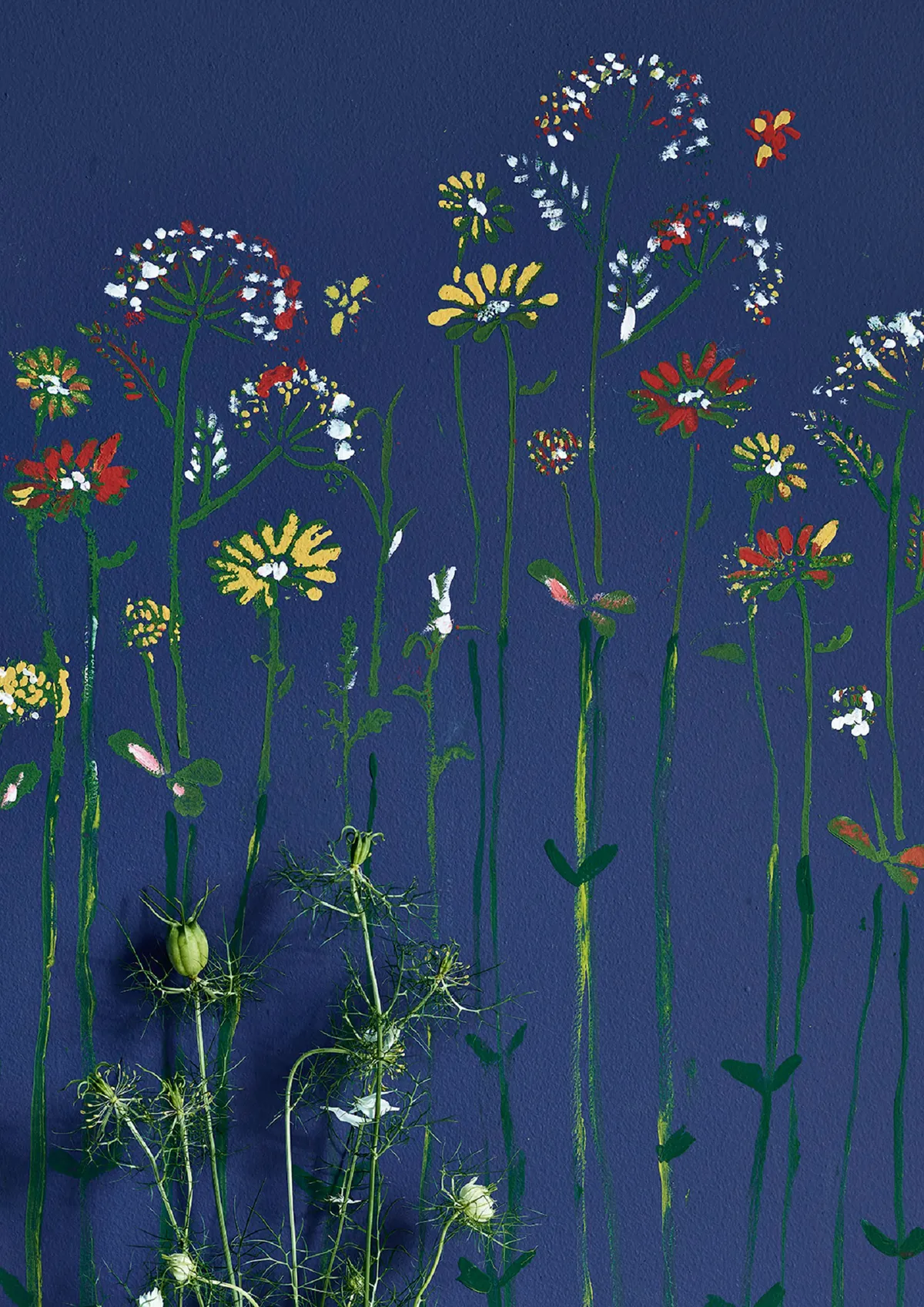 Meadow Flowers stencil, £17.95; walls painted in Napoleonic Blue, £41.95 for 2.5L; stencilled flowers painted in a selection of chalk paint, from £5.95 for 120ml, all Annie Sloan