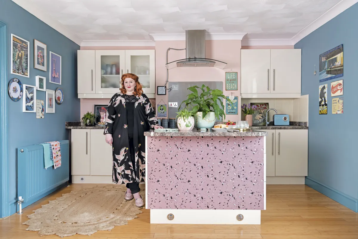 ‘I love a gallery wall. In the kitchen I’ve added plates to the mix, but I’m just as happy leaning prints against a wall or floor for a more theatrical look’